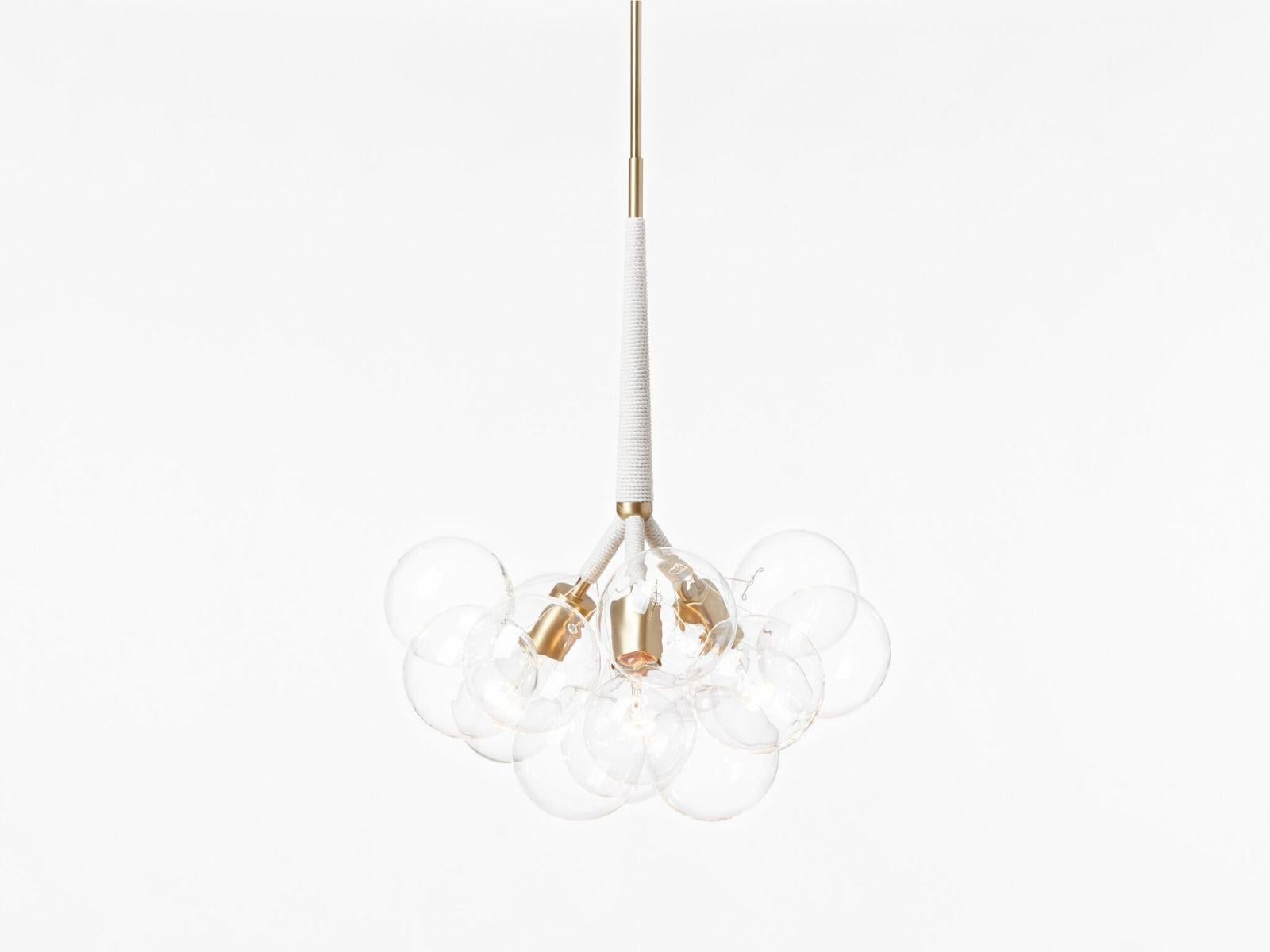 Ethereal and iconic, the Bubble Chandelier is a modern re-interpretation of the crystal chandelier. Its luminous constellation of delicate glass globes adds beauty and depth to any interior environment.

Based on an original design first conceived