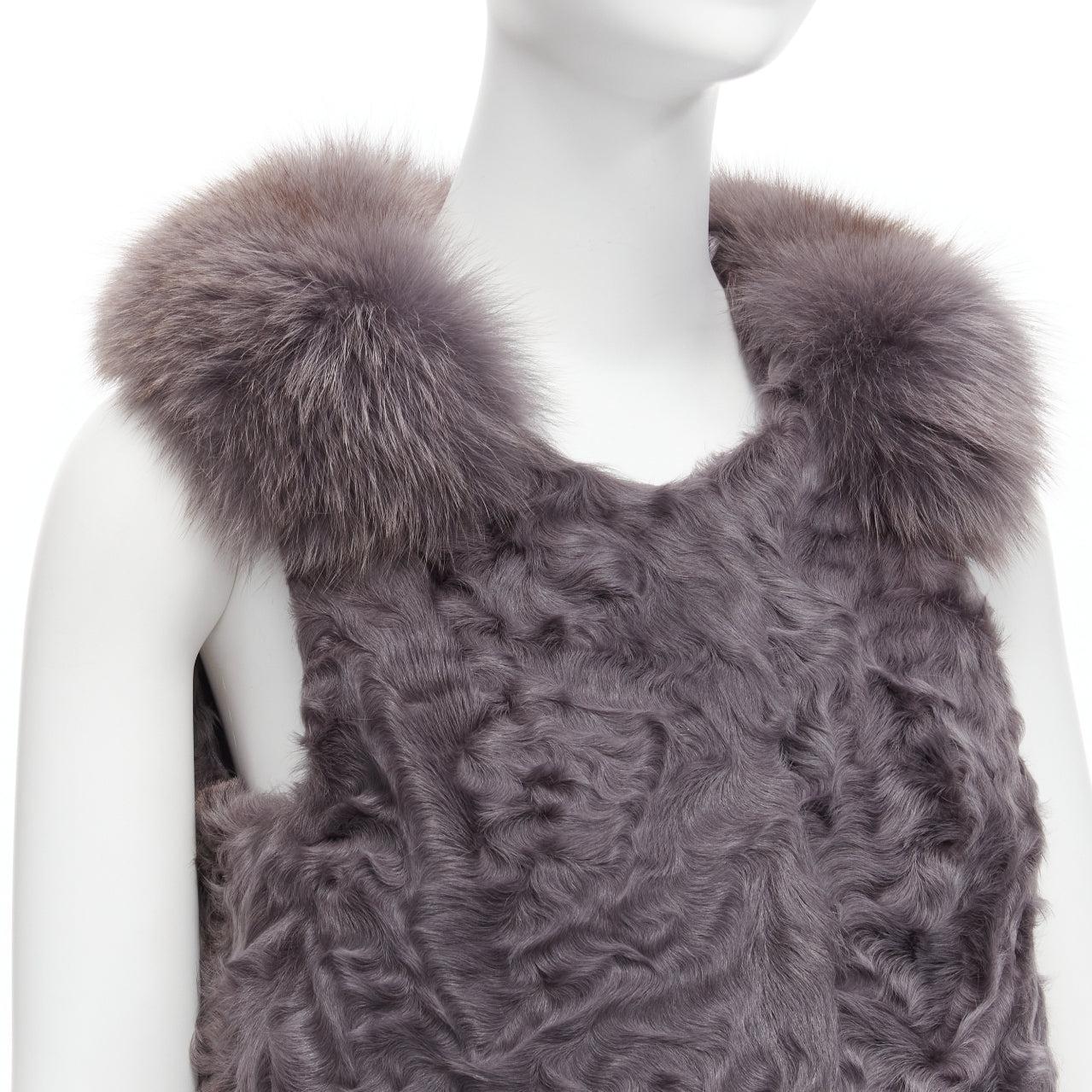 PELLICCISSIMA grey Astrakhan fur collar sleeveless winter vest jacket S
Reference: SNKO/A00381
Brand: Pelliccissima
Material: Fur, Fur
Color: Grey
Pattern: Solid
Closure: Hook & Eye
Lining: Grey Fabric

CONDITION:
Condition: Excellent, this item was