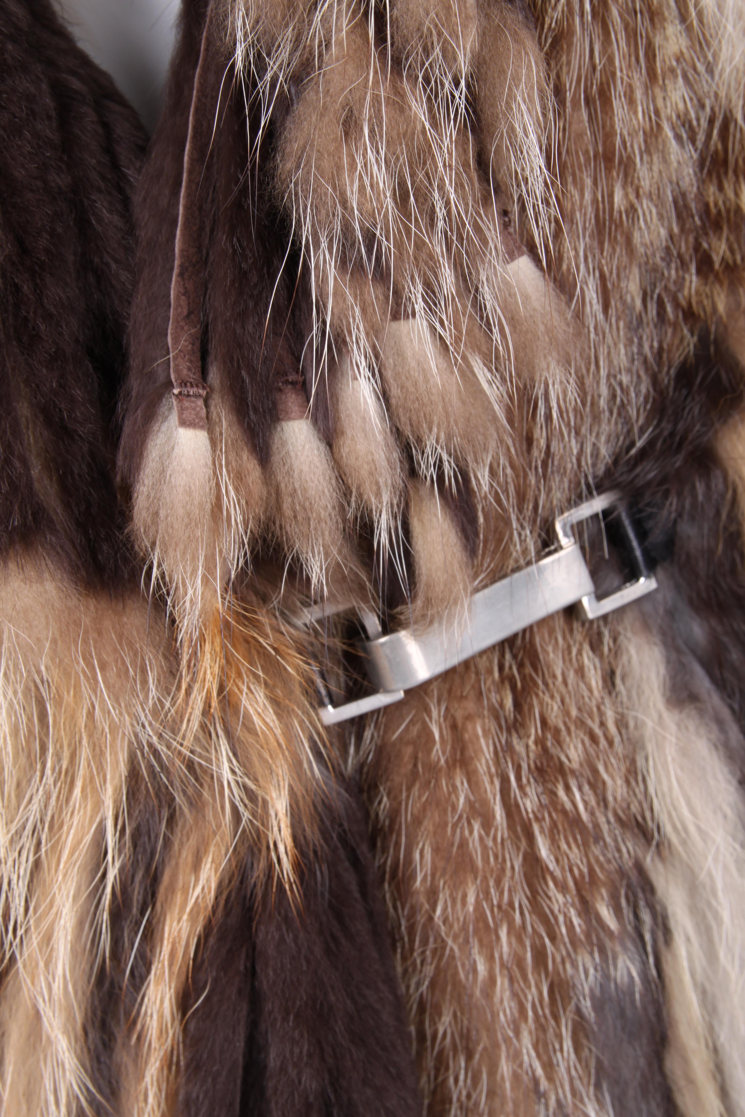 
Brown fur vest from Pelsland. There is a hook to close the vest at the front. The sleeves just don't reach the wrists.
Size: One size
Color: Brown 
Condition: 9/10