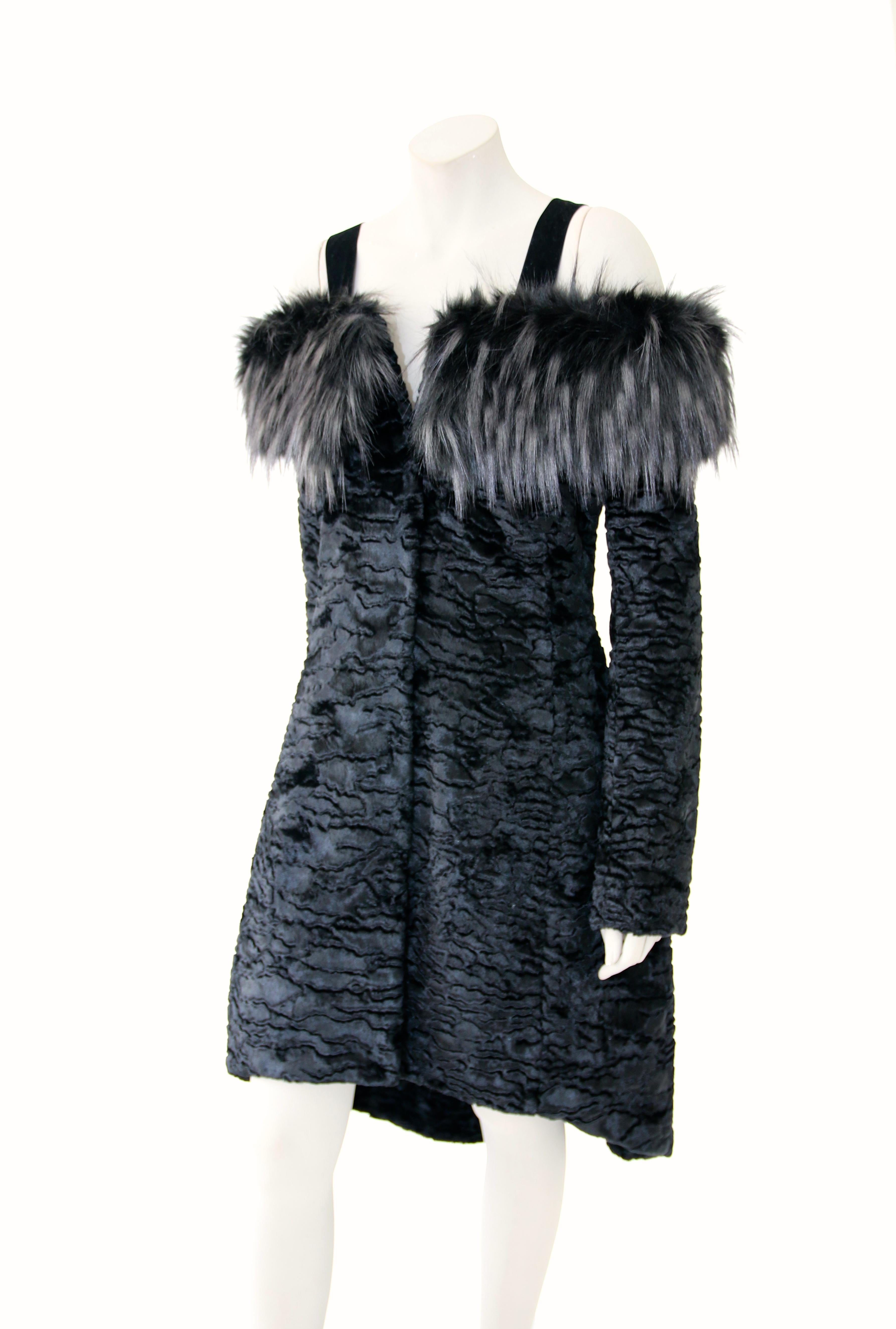 The Isabella Pelush black faux fur Astrakhan coat with tail is a one of a kind exclusive piece. Featuring the highest quality man made pelage, this stylish fake faux fur coat is a beautiful replica of the Astrakhan Karakul Broadtail fur. 