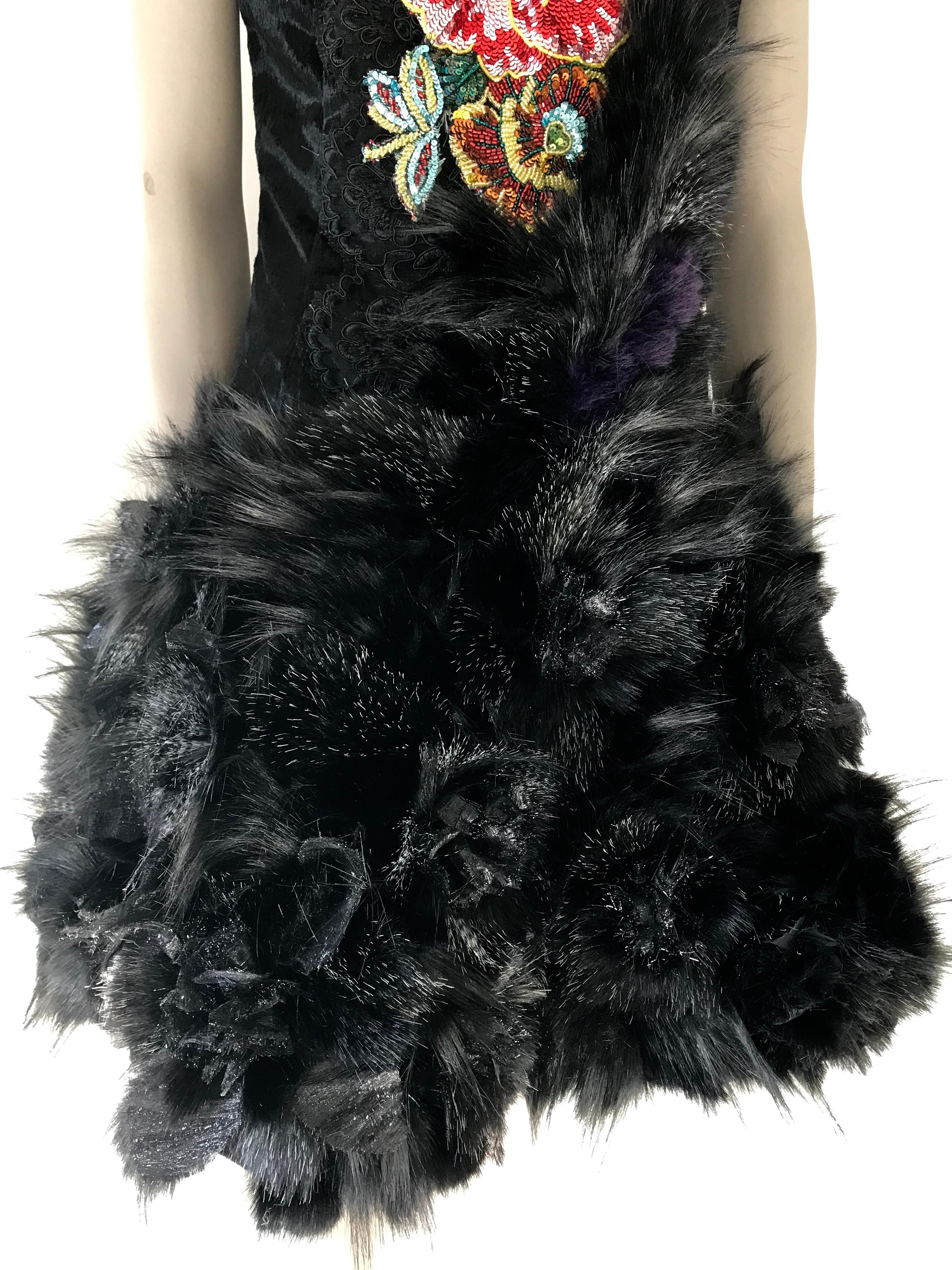 The Rose Pelush black faux fur dress with three dimensional flowers is a one of a kind exclusive Couture piece. Featuring the best quality man made pelage, this extraordinary fur free dress is a beautiful replica of the fox, mink, chinchilla and