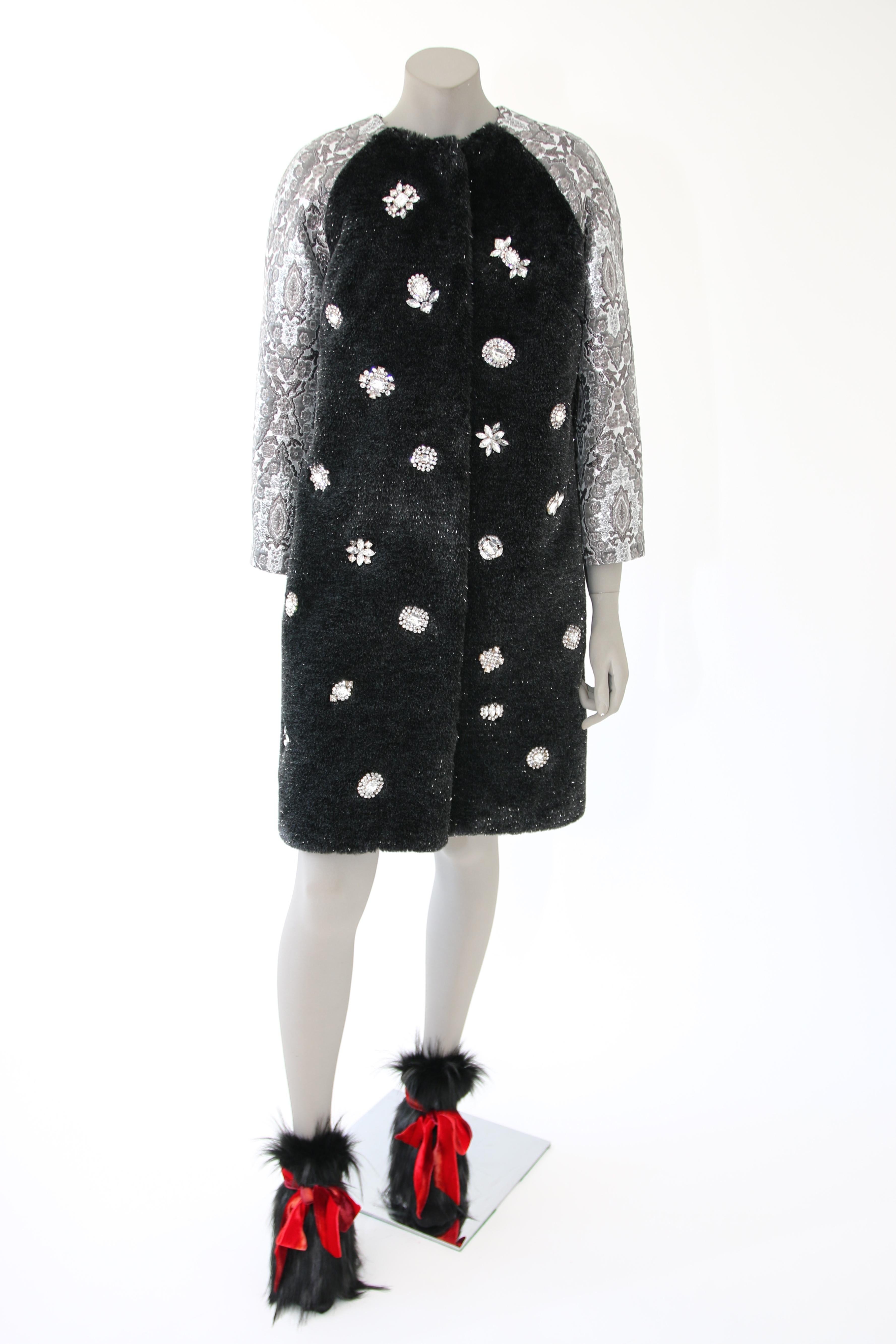 The Lulu Pelush black faux fur mink coat with vintage crystals and silver Damask brocade sleeves, is a one of a kind exclusive piece. Featuring the highest quality man made pelage, this extraordinary and unique fake faux fur coat is a beautiful