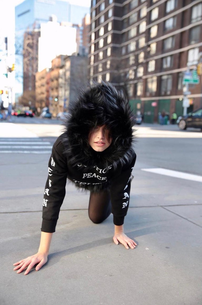 The Tamara Pelush black hood with faux fur fox trim and Swarovski crystals is a one of a kind exclusive piece. Featuring the highest quality man made pelage this original fur free hood has a stunning replica of the fox fur as a trim. Embellished by