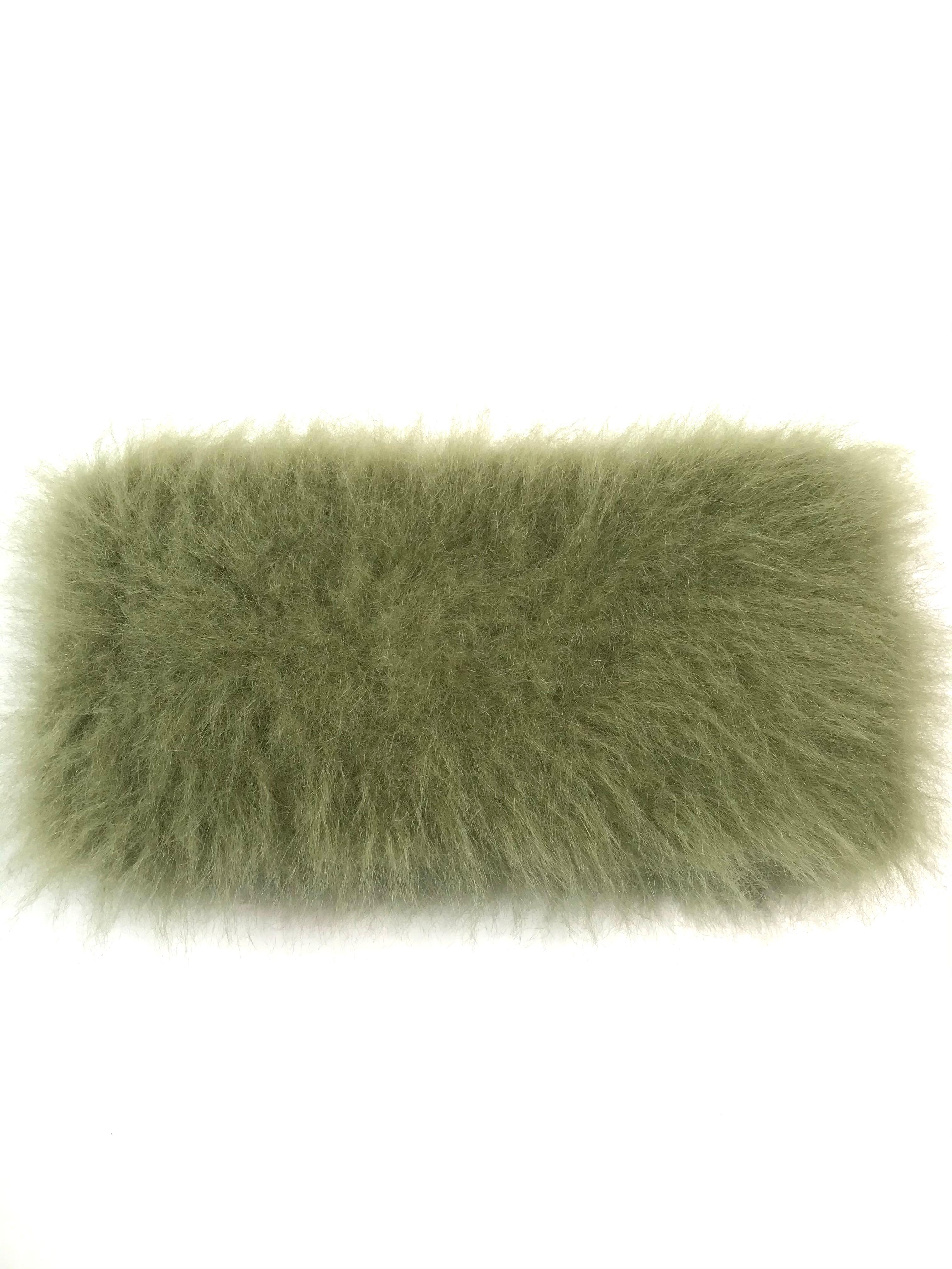 This beautiful pair of Pelush faux fur scarfs are sold as a set and they are one of a kind. Featuring the highest quality man made pelage, these soft and elegant neck warmer in green shades are a perfect replica of the chinchilla and alpaca fur.