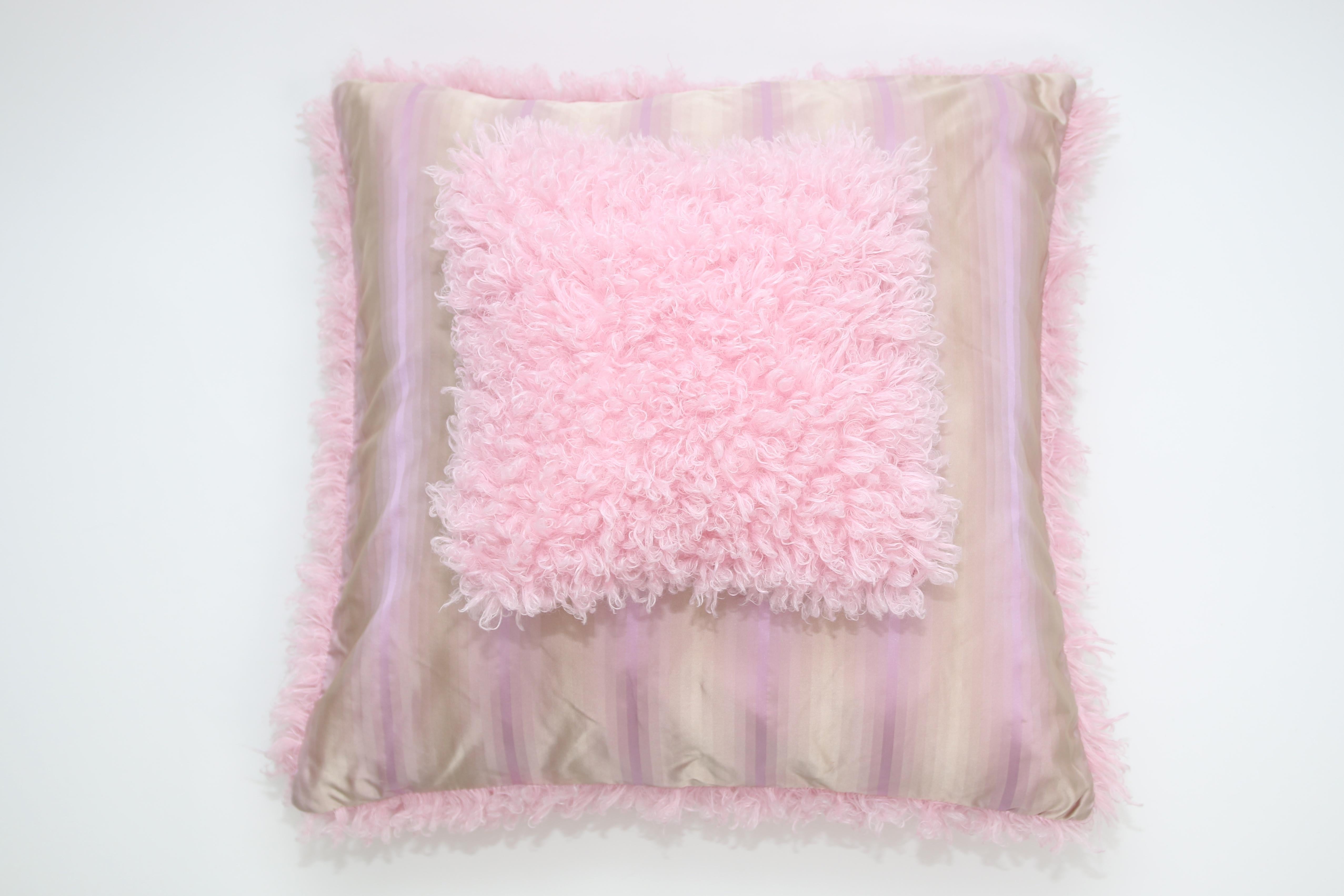 This pair of Pelush pink poodle faux fur pillows are made with a custom boucle' fabric and Italian silk backing. The inside filling is down alternative. Match them with the same throw pink blanket and mix them with our biggest sizes pillows for a