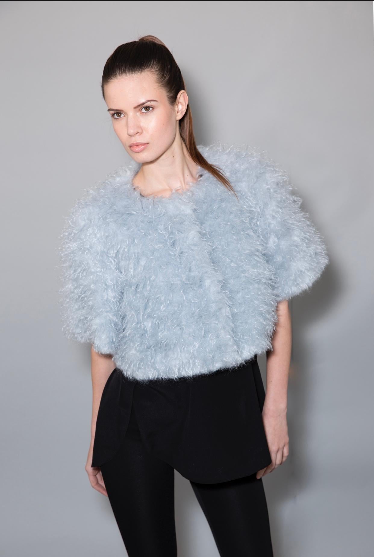 The Olivia Pelush powder blue mohair jacket is an exclusive piece. Featuring the highest quality mohair in the world made by an historic mill in Europe, this etherial shaggy cropped jacket is perfect for the coldest months of the year. Timeless,