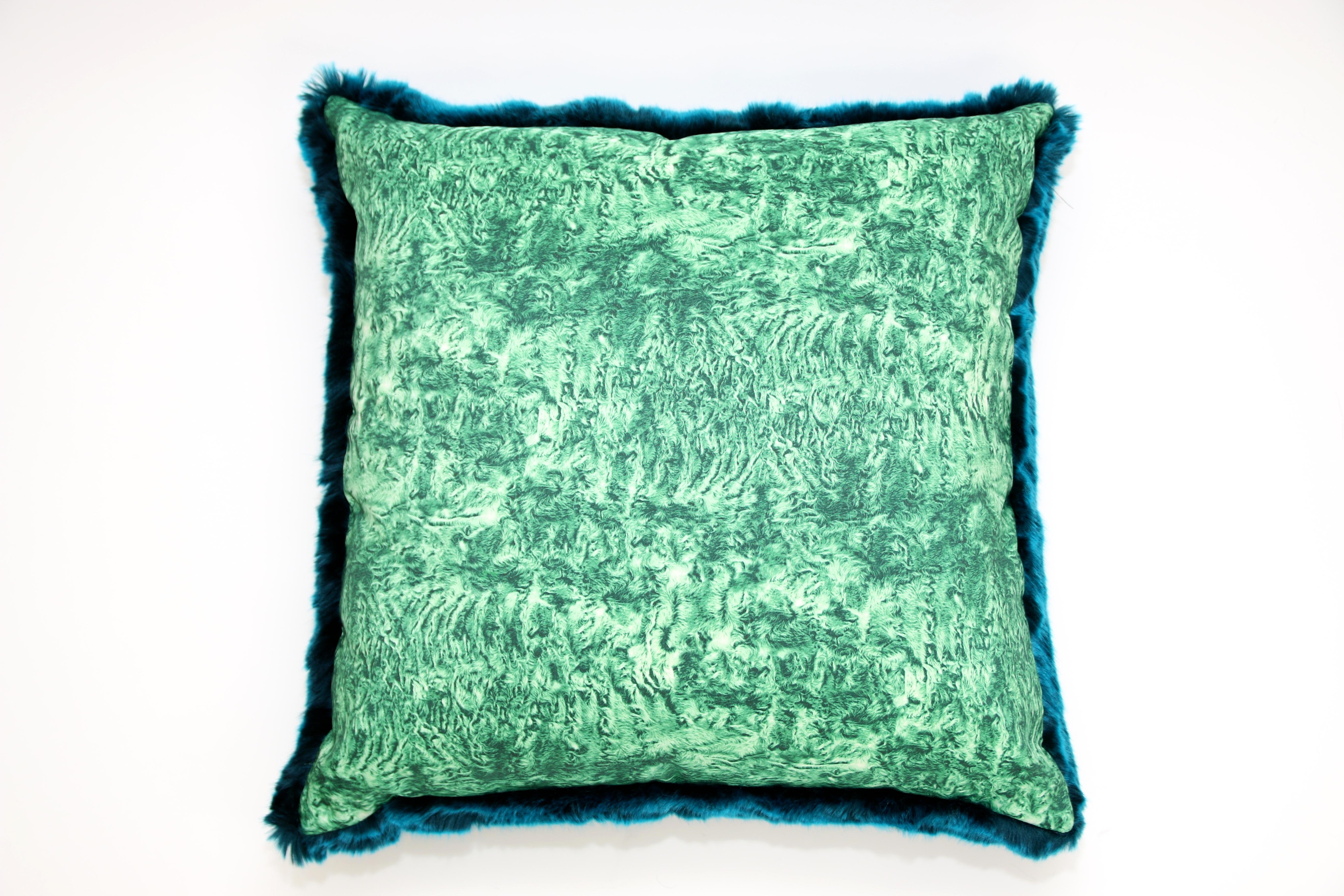 This pair of Pelush teal chinchilla faux fur large throw pillows are made with the highest quality man made pelage and is a beautiful replica of the chinchilla fur. Extra soft and silky to the touch, they can be reverse to a beautiful Italian faille
