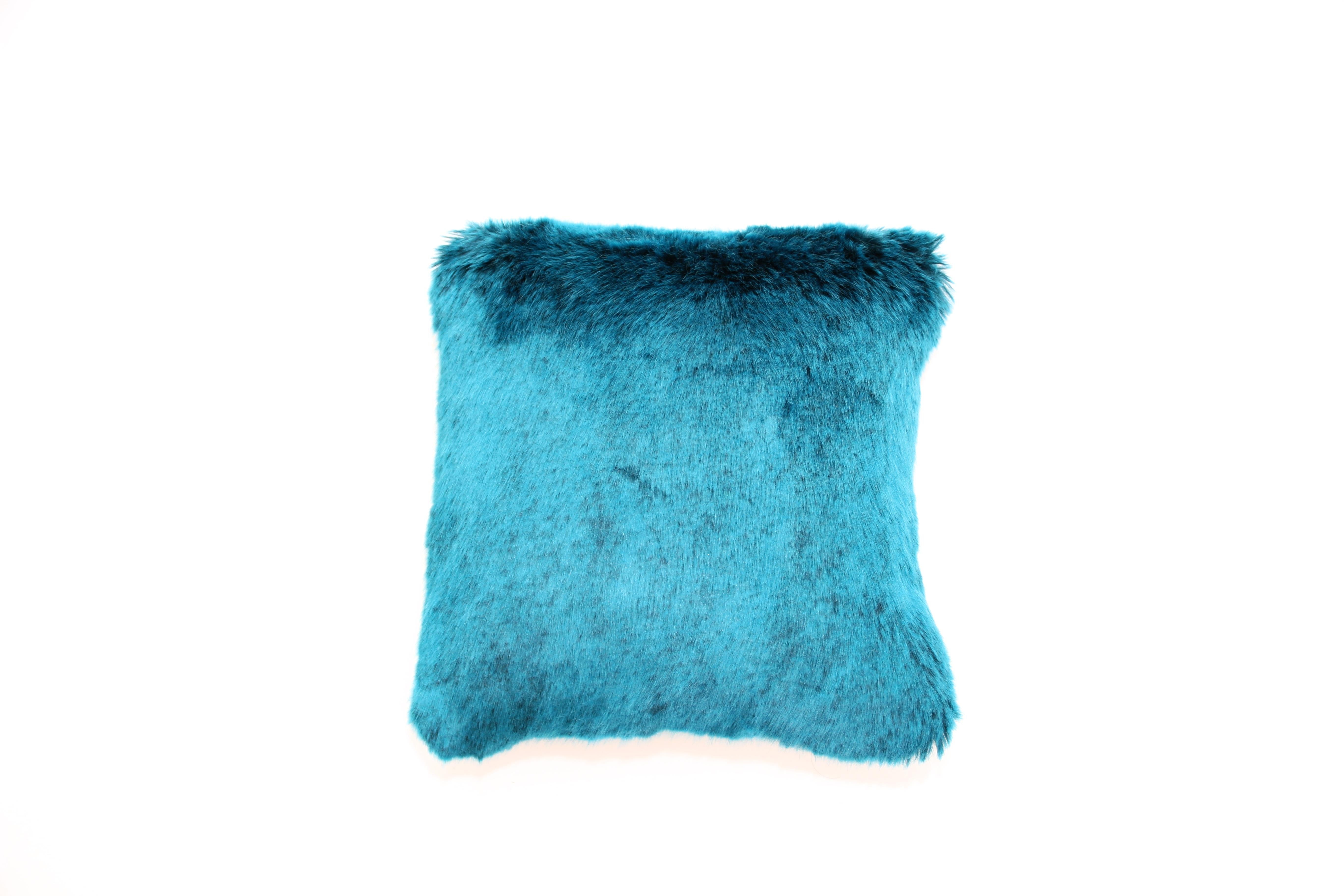 This pair of Pelush teal chinchilla faux fur small throw pillows are made with the highest quality man made pelage and is a beautiful replica of the chinchilla fur. Extra soft and silky to the touch, they can be reverse to a beautiful Italian faille