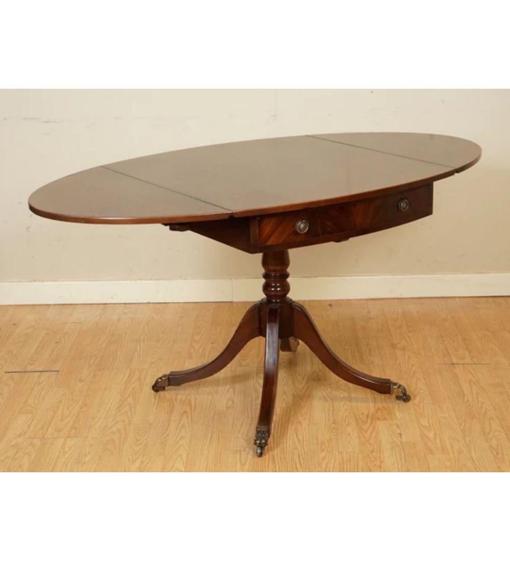 British Pembroke Drop Leaf Dining Table Featuring Two Deep Drawers