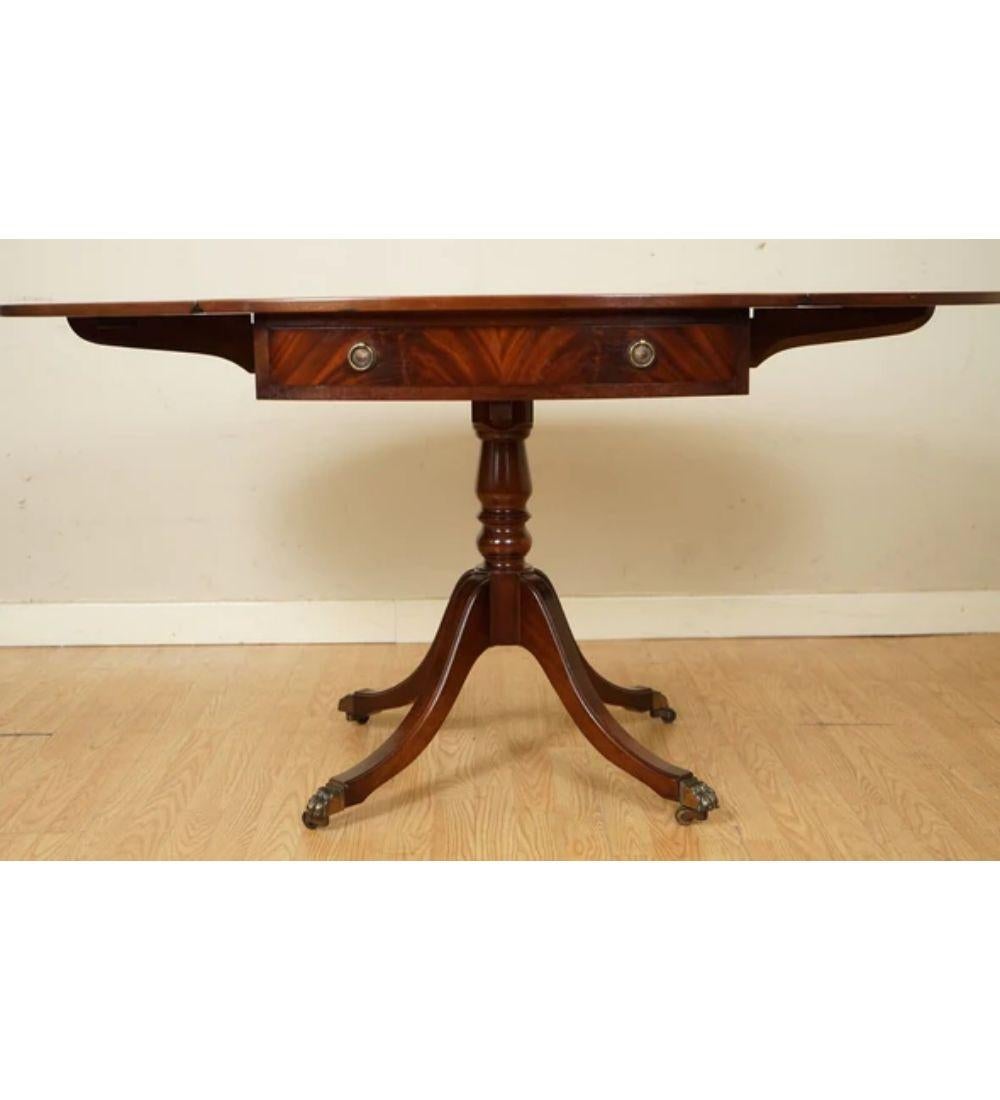 Hand-Crafted Pembroke Drop Leaf Dining Table Featuring Two Deep Drawers