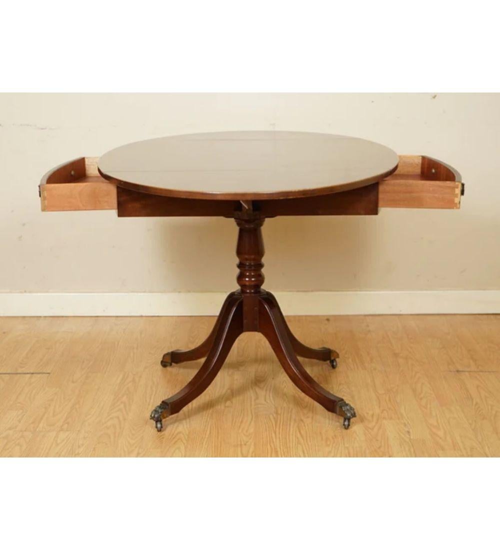 20th Century Pembroke Drop Leaf Dining Table Featuring Two Deep Drawers