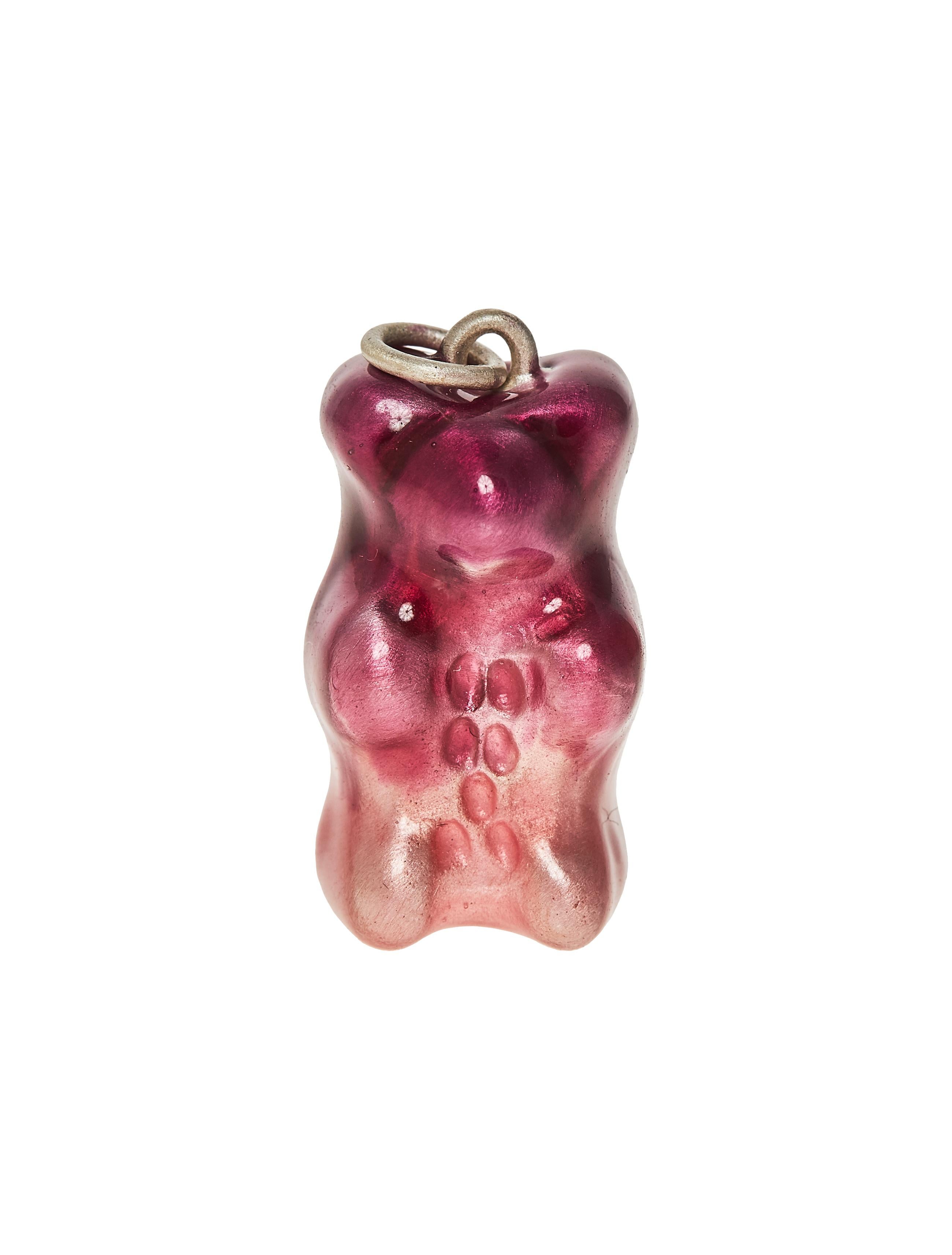 Ombre Plum  Gummy bear 
Sterling silver plated  gummy bear pendant on silver  plated chain with transparent ombre plum  enamel coverage. 

The Gummy Project by Maggoosh is a capsule collection inspired by the designer's life in New York City and her