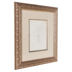 Disegno a matita di donna con cornice dorata