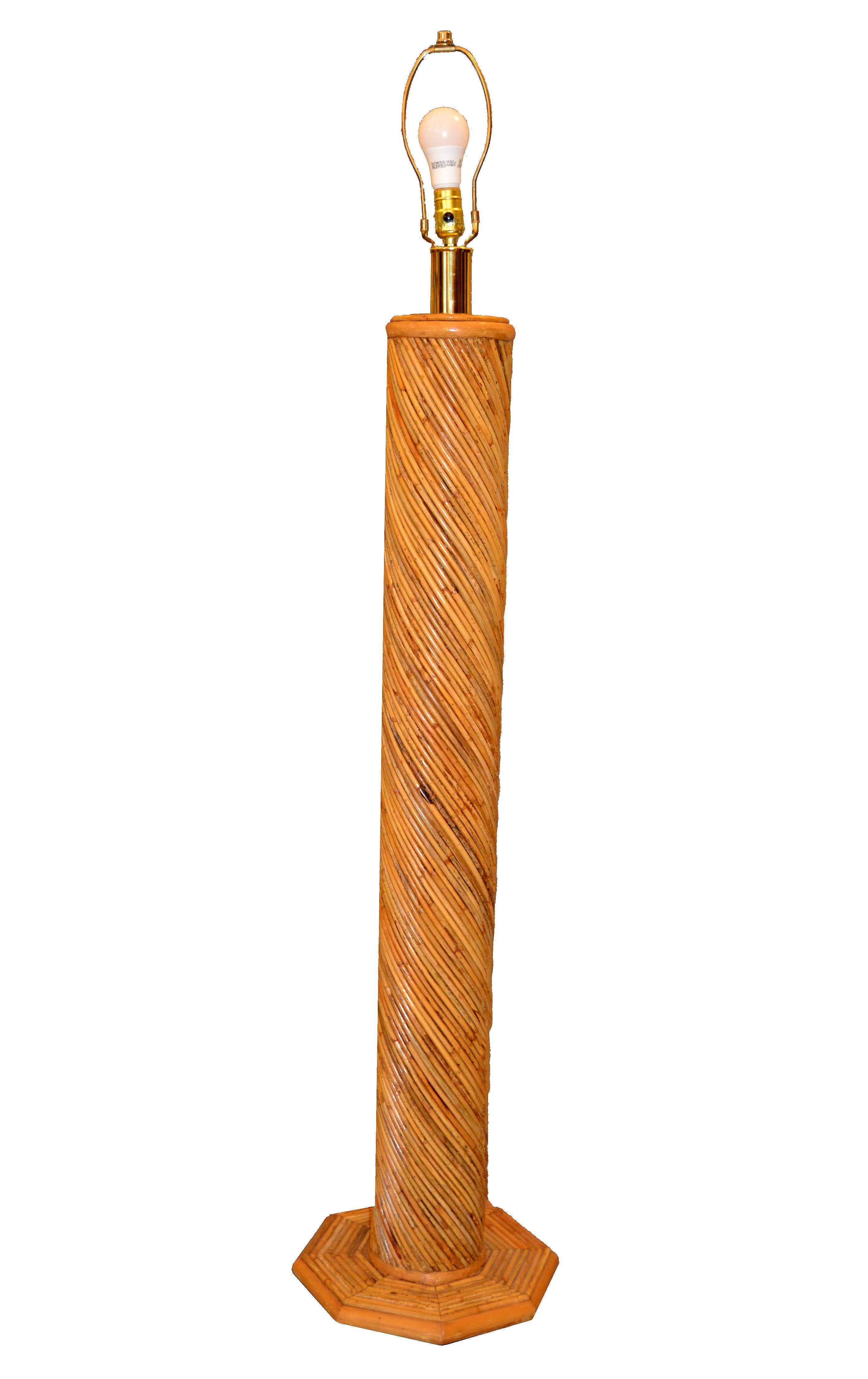 Handcrafted tall Mid-Century Modern pencil reed bamboo floor lamp with brass details.
Comes without the shade.
Is wired for the U.S. and uses a max. 60 watts light bulb.
Great addition for Your Sunroom.