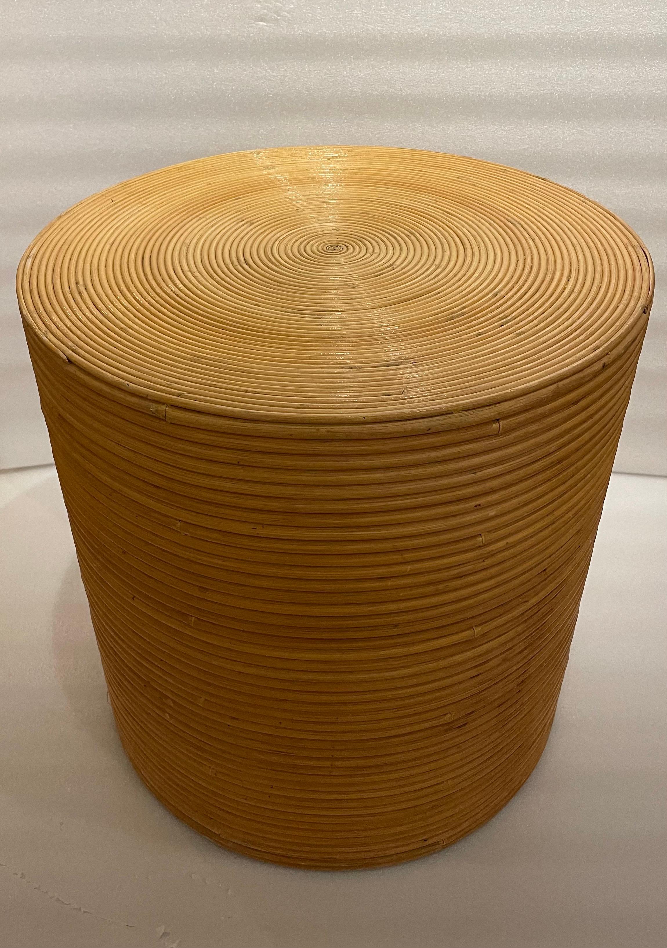 Versatile round pedestal reed bamboo end table, with glass top, nice vintage condition circa 1980