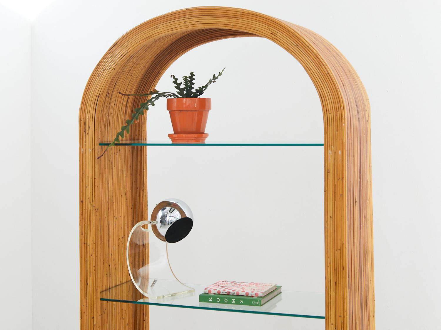Say hello to the 1970s pencil reed etagere—a stylish storage solution that adds a touch of boho charm to your space. It's the perfect spot to showcase your favorite books, plants, and maybe even a lava lamp.

- 75