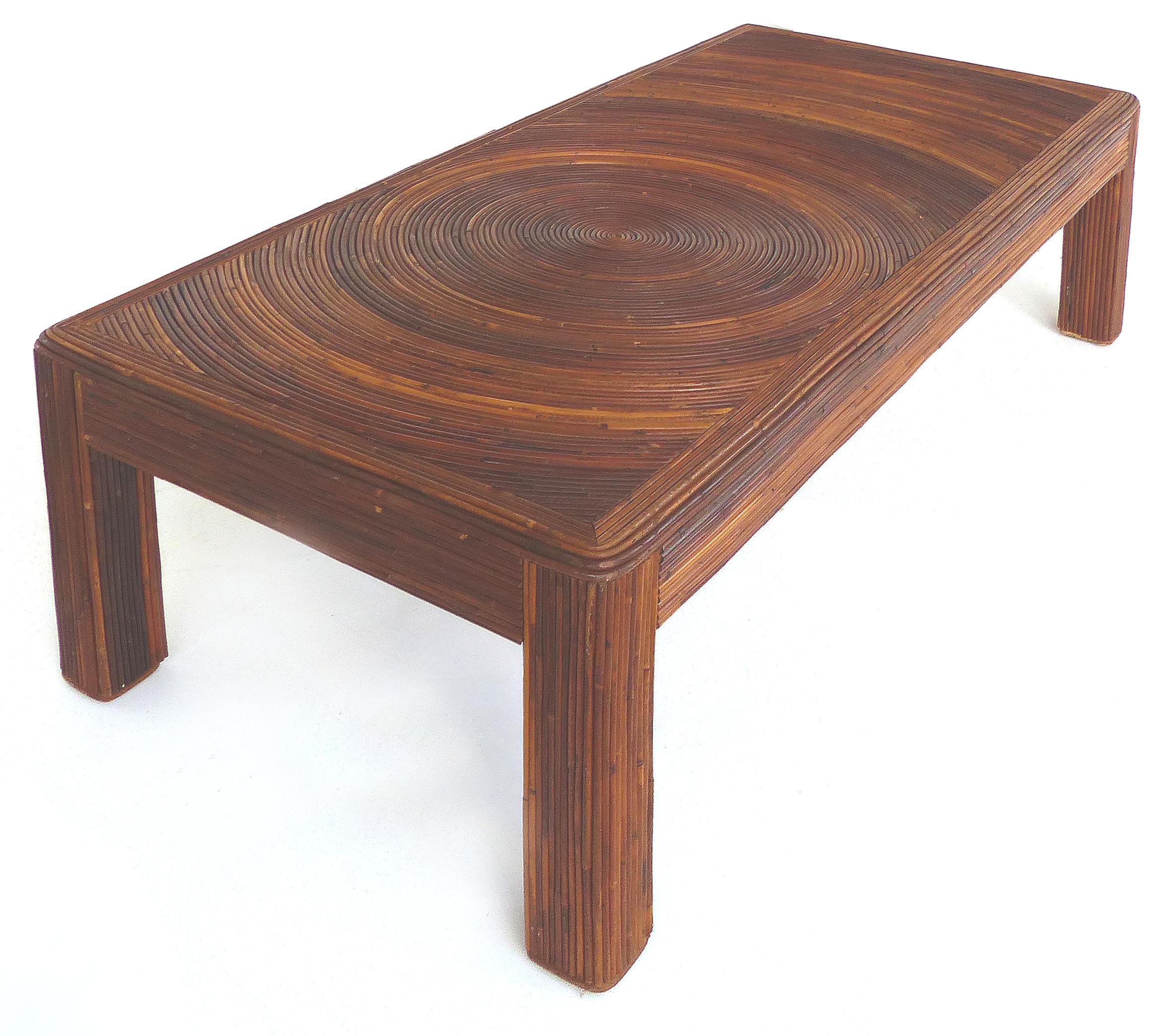 Pencil Reed Mid-Century Modern Coffee Table in the Style of Gabriella Crespi

Offered for sale is a Mid-Century Modern rectangular reeded coffee table in the manner of Gabriella Crespi. The table is clad in pencil reed and the top pattern has