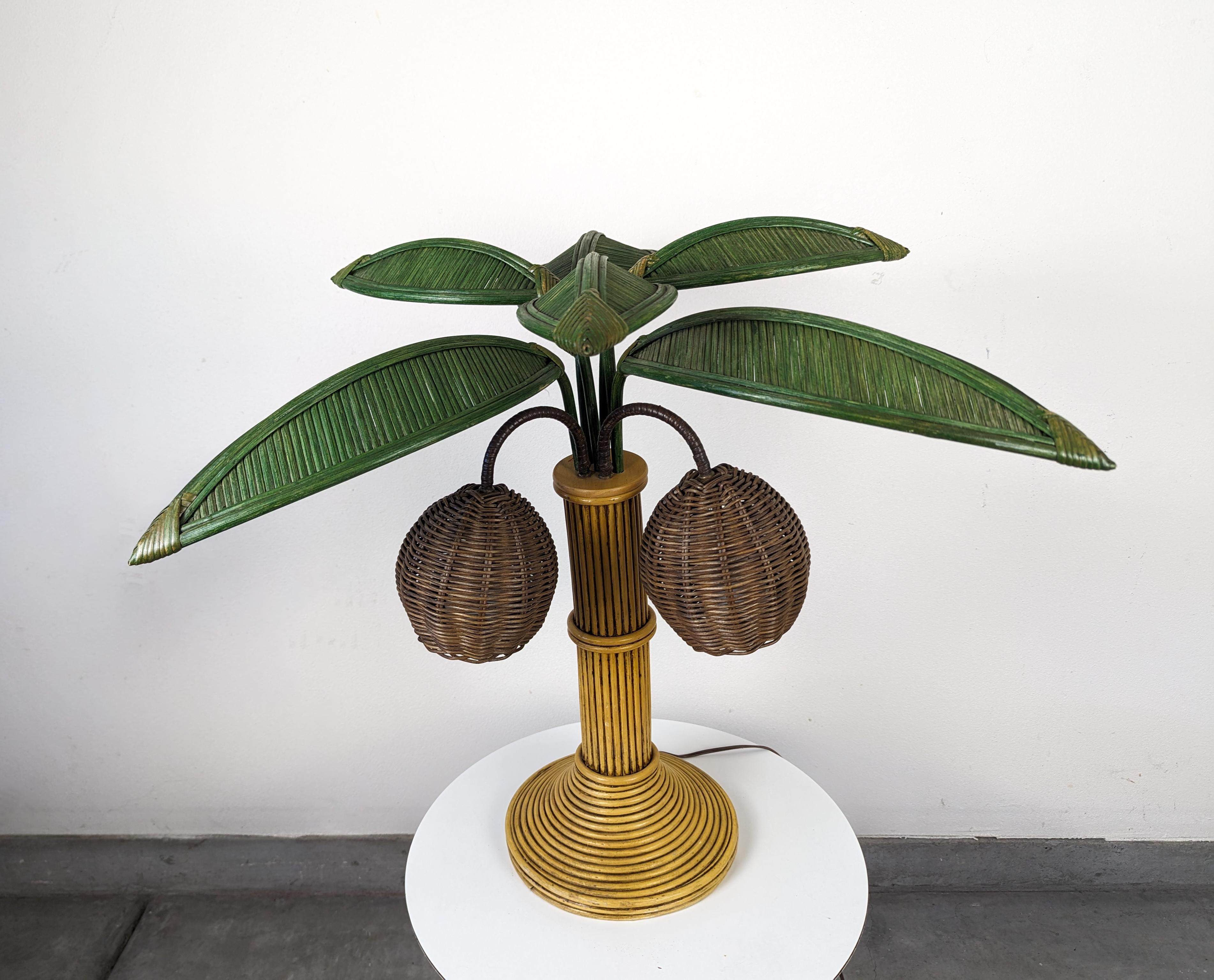 Just in, a beautiful pencil reed palm tree table lamp attributed to Mario Torres Lopez. Features removable/adjustable leaves to arrange how you like! 

Would pair well with any bohemian/coastal setting. If you have any questions, please feel free to