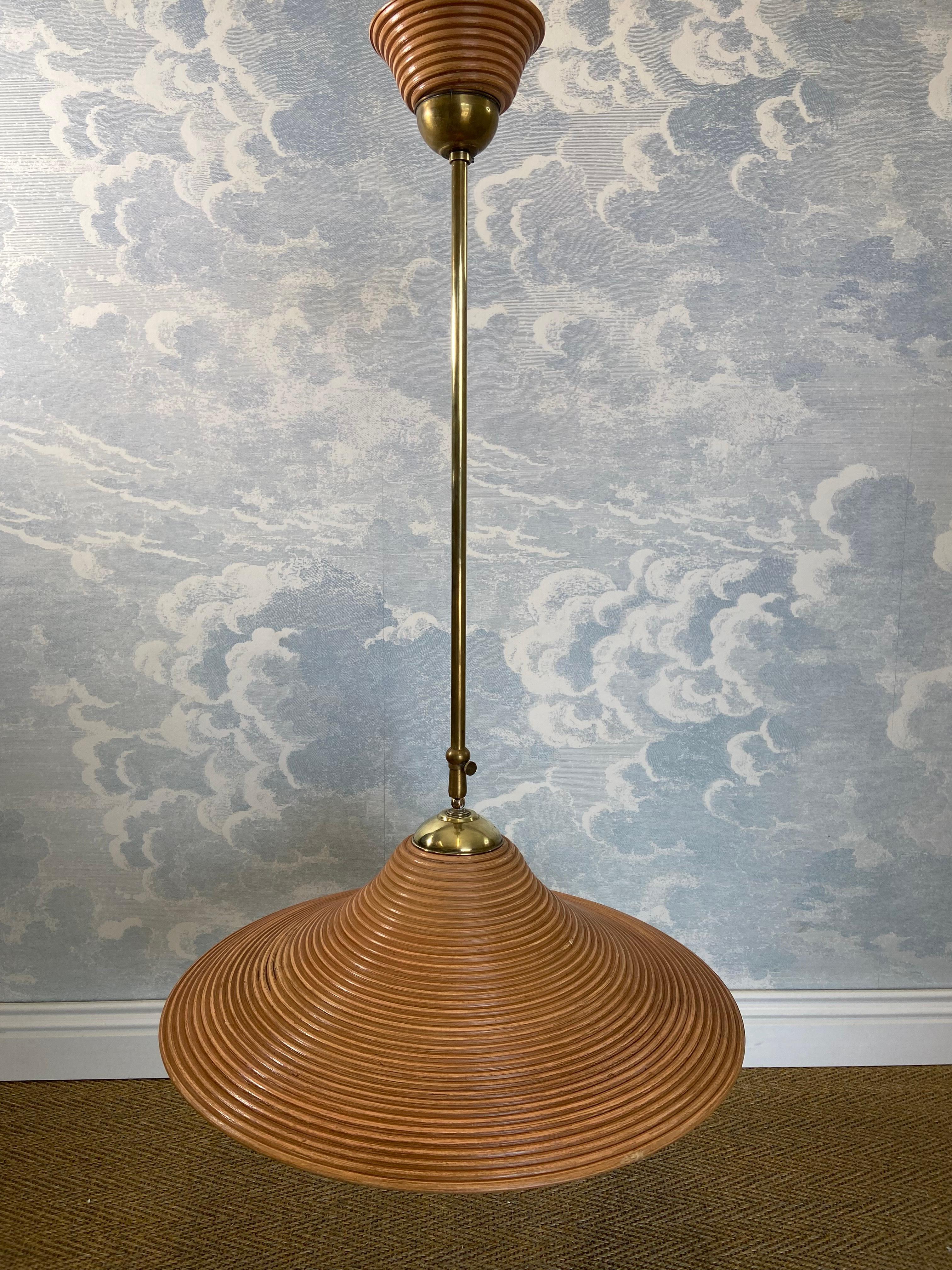 We always like the 'witch-hat' shape when it comes to pendant lights. Its a timeless design classic that works really well for illuminating larger areas such as dining tables evenly. 

We were especially attracted to this pendant lamp as it features