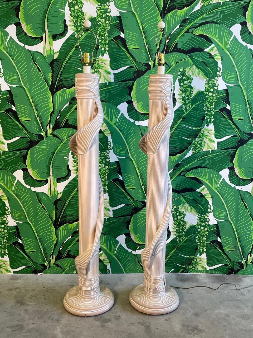 Pair of floor lamps attributed to Betty Cobonpue feature the iconic 