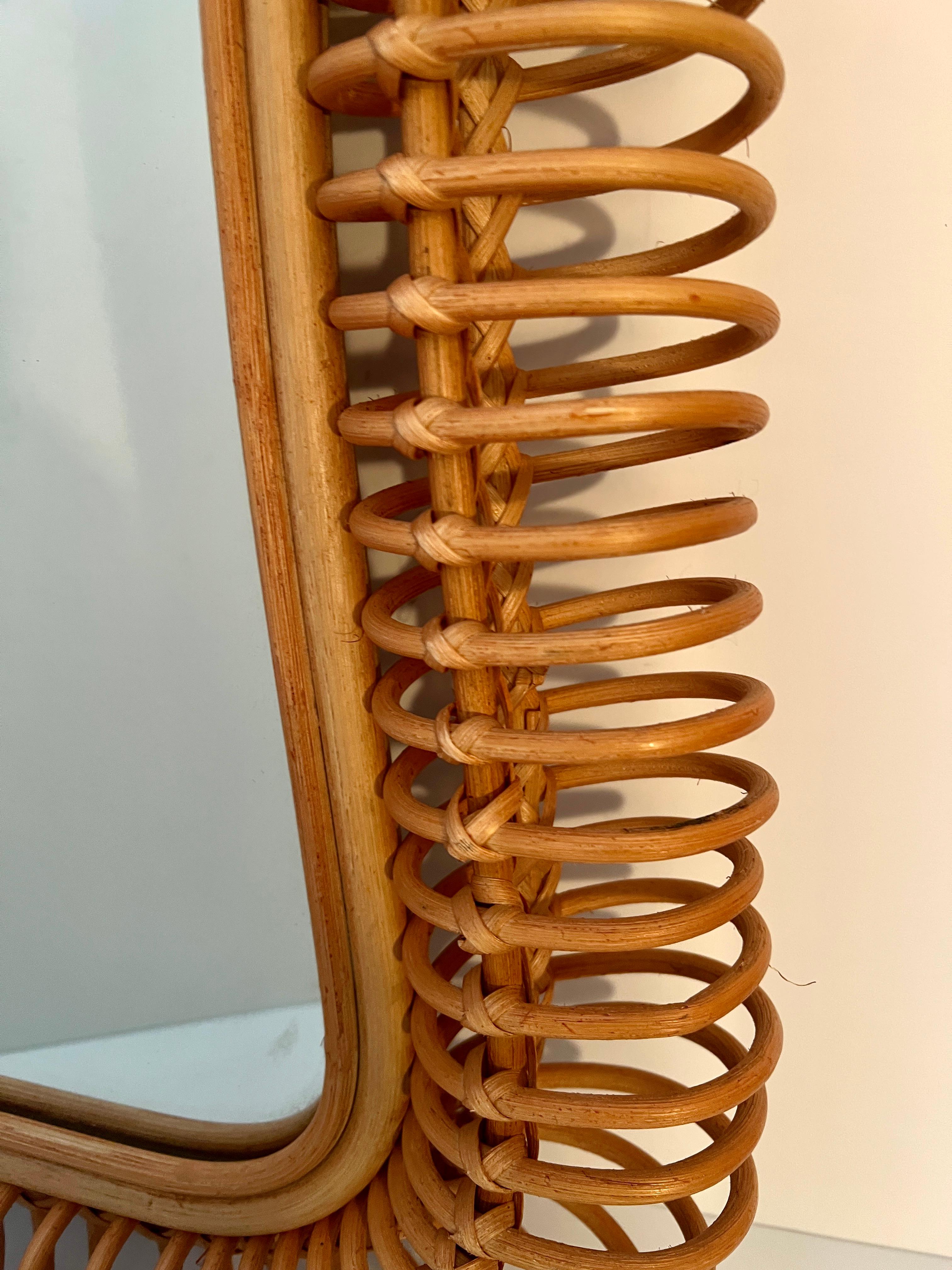 Pencil Reed Rattan Swirl Around a Woven Intricate Frame 1