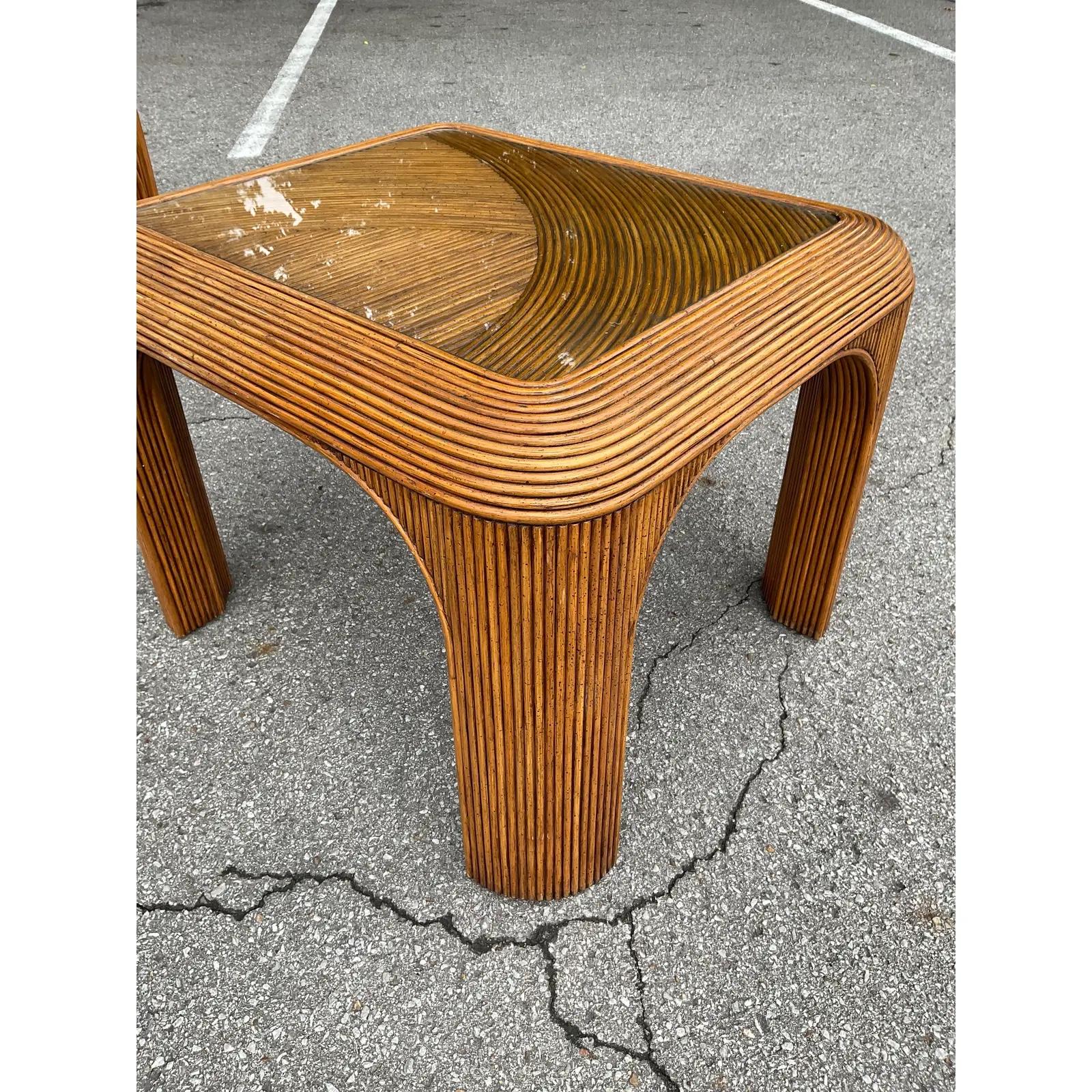 This beautiful pencil reed side table is stained a beautiful dark brown. The detailed pattern of the reeds on the top of the side table we’ve across one another topped with a glass top adds such beautiful to the piece. This would be gorgeous in a