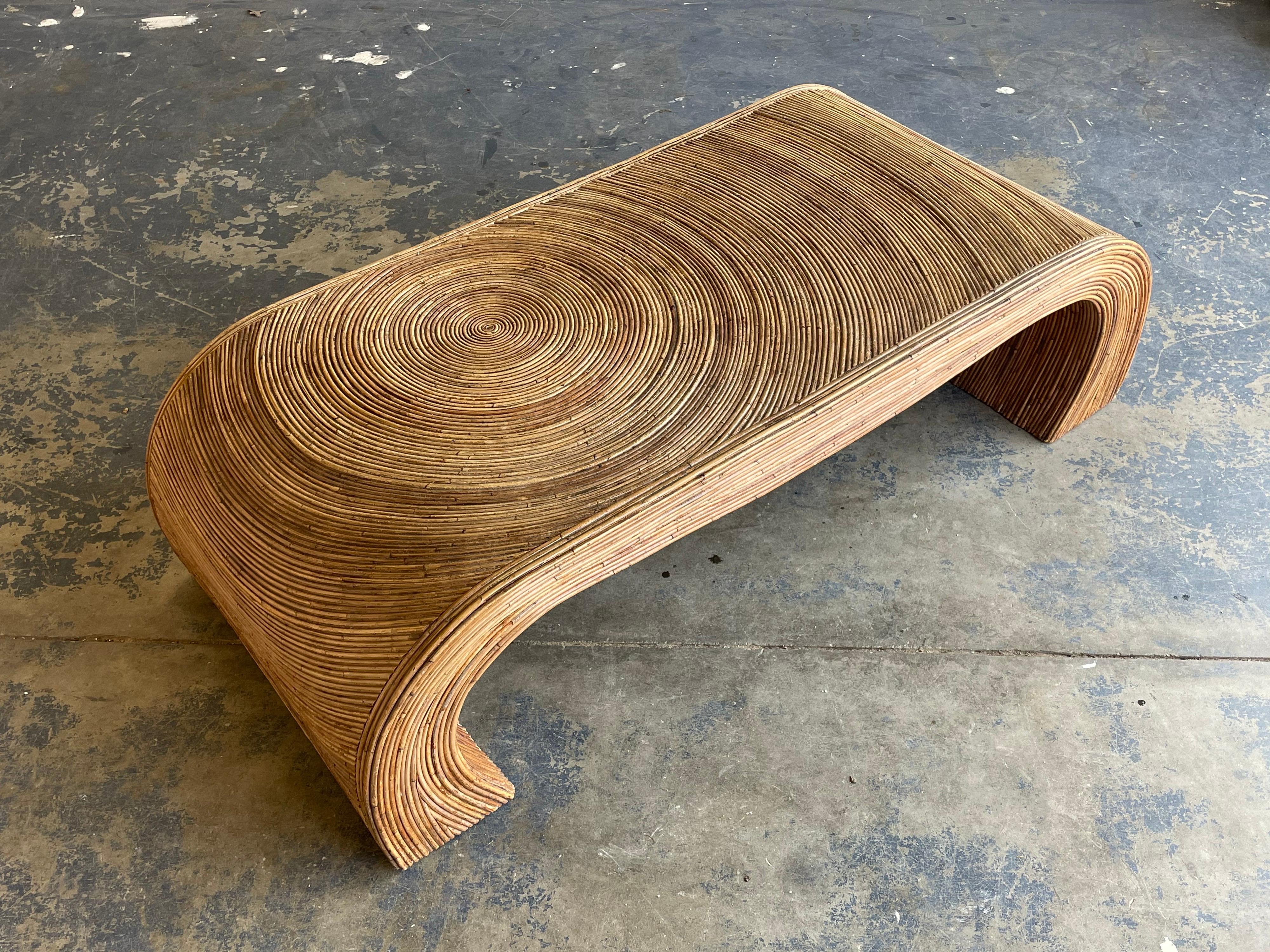 Iconic split reed coffee table after Gabriella Crespi. Wonderful form and use of materials. Blends well with other organic modernism designs such as Paul Laszlo, Paul Frankl, Vladimir Kagan, and T.H. Robsjohn-Gibbings.