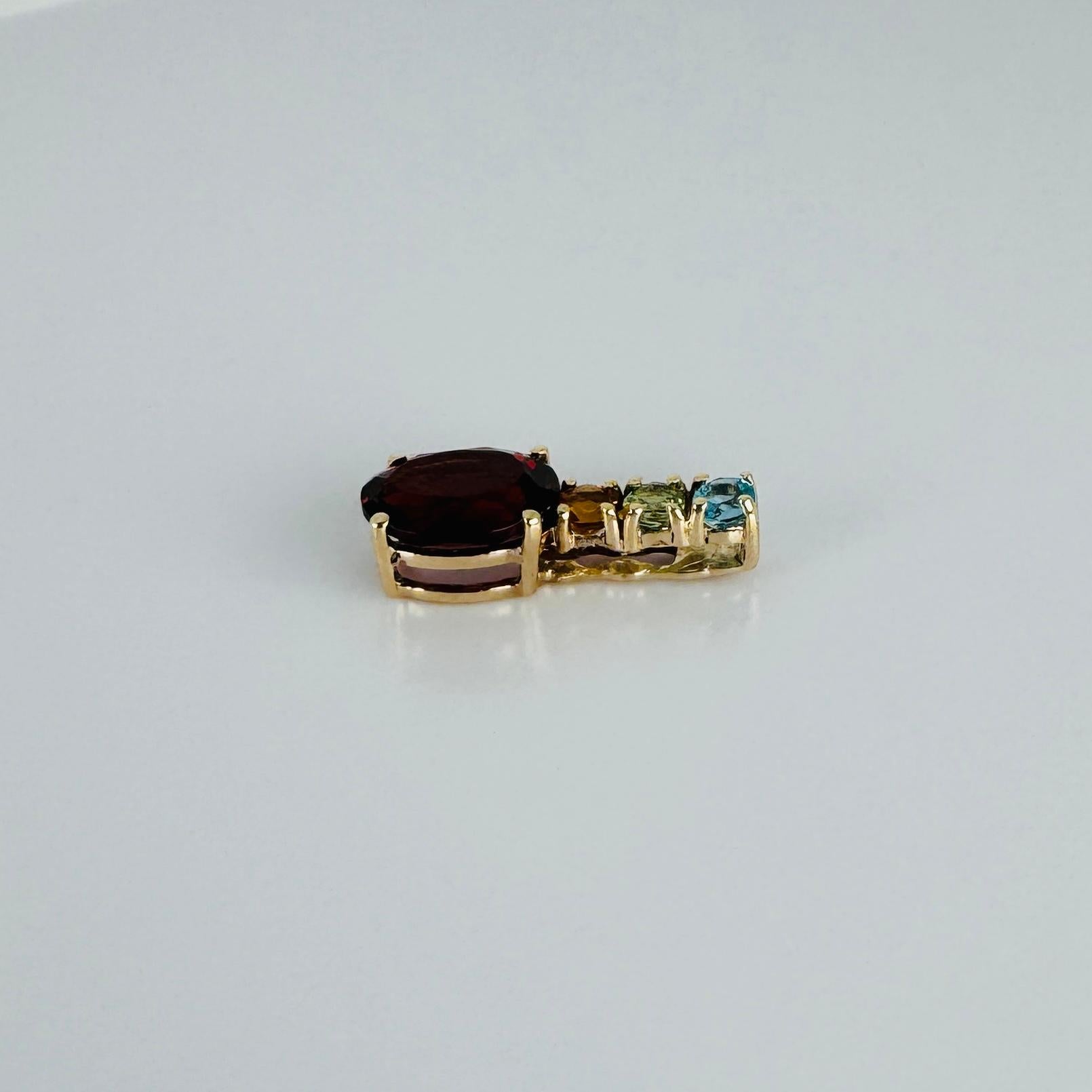 Pendant 14k yellow gold oval garnet 0.41 carat, citrine, peridot, topaz 0.09 ct In Good Condition For Sale In Heemstede, NL