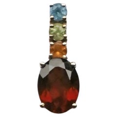 Pendant 14k yellow gold oval garnet 0.41 carat, citrine, peridot, topaz 0.09 ct