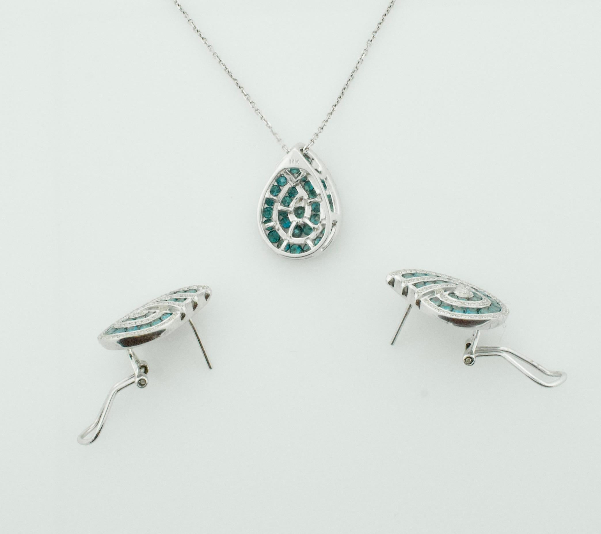 Modern Pendant and Earring Set with Blue Diamonds in White Gold For Sale