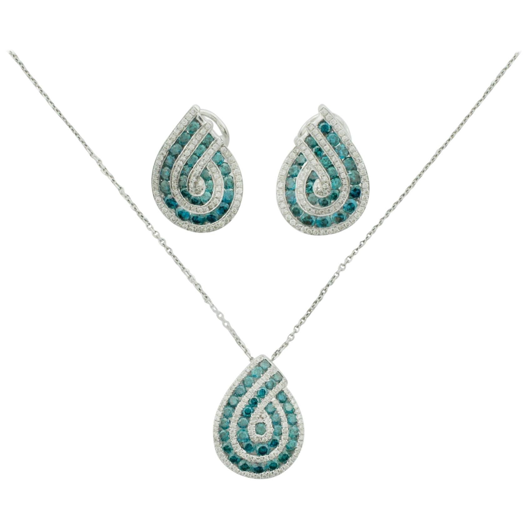 Pendant and Earring Set with Blue Diamonds in White Gold For Sale