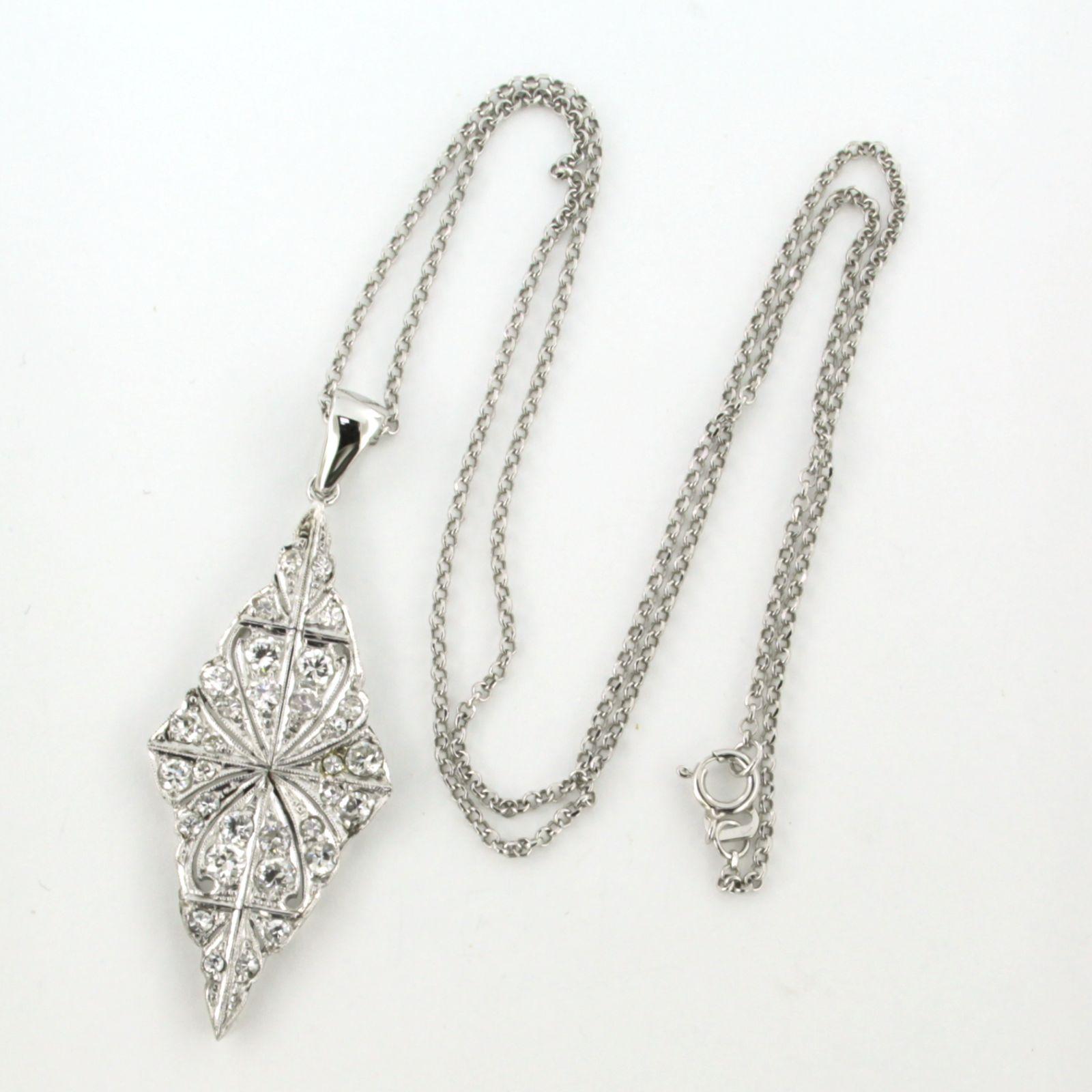 14k white gold necklace with an ART NOUVEAU 14k white gold and platinum pendant set with old European cut diamonds up to. 1.00ct – F/G – VS/SI - 45 cm long

Detailed description

the length of the necklace is 45 cm long by 0.9 mm wide

Dimensions of