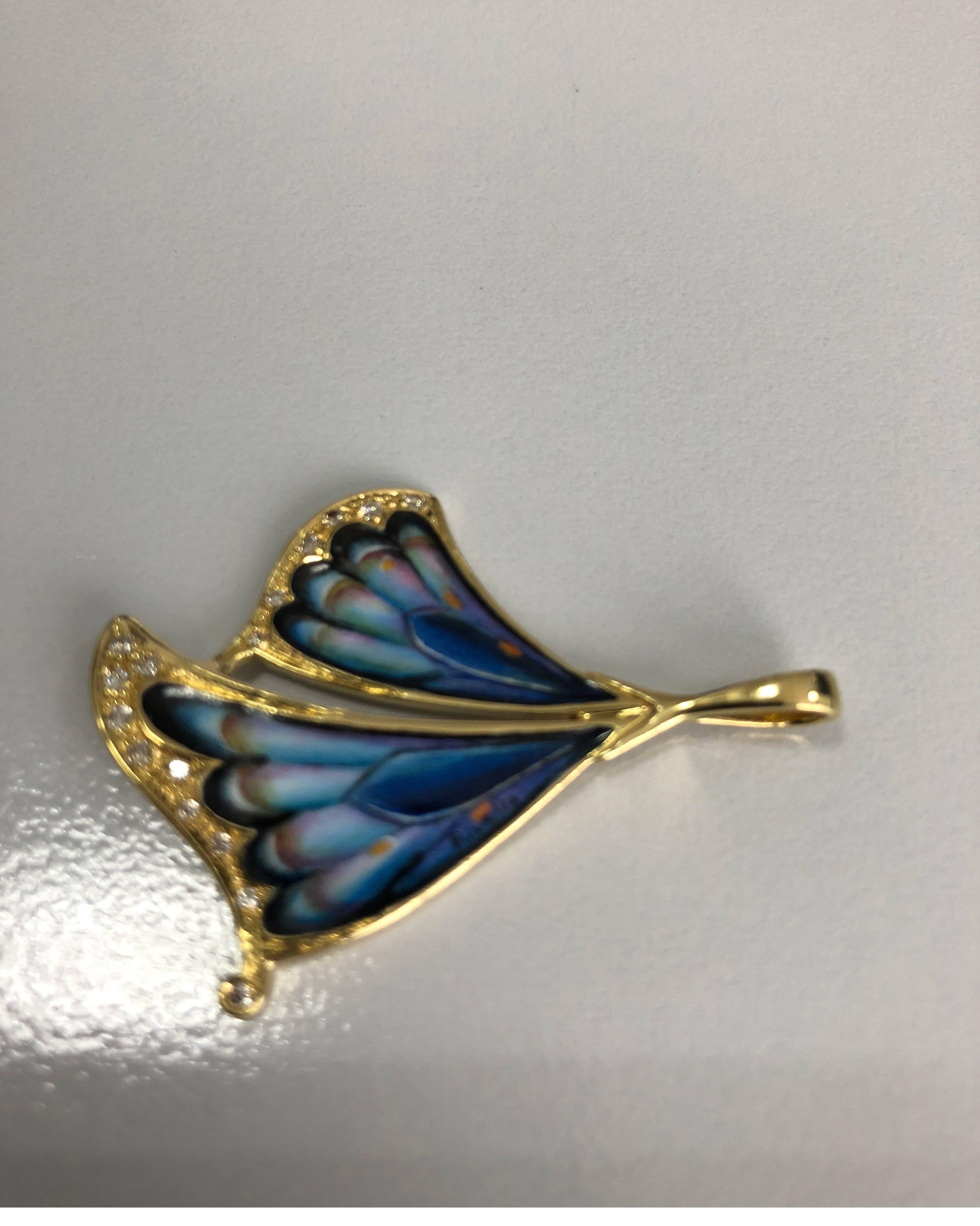 Pendant blue enameled  wings in yellow gold 18 kt and white diamonds
total gold weight gr 9
total diamond ct 0,15
STAMP 10MI 750