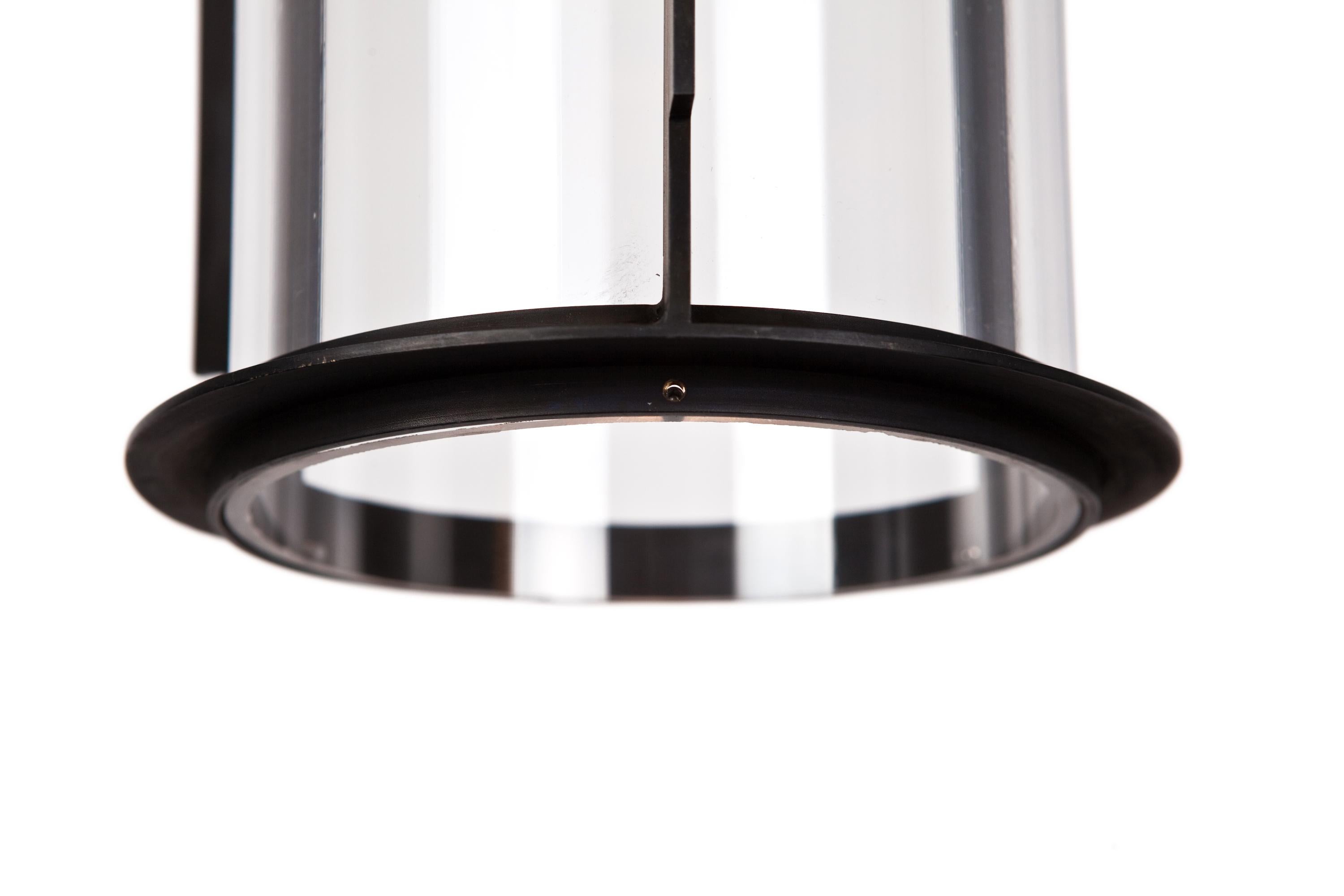 A pendant made in chemically blackened brass and polycarbonate with E27 lamp
Also available in wall fixture.