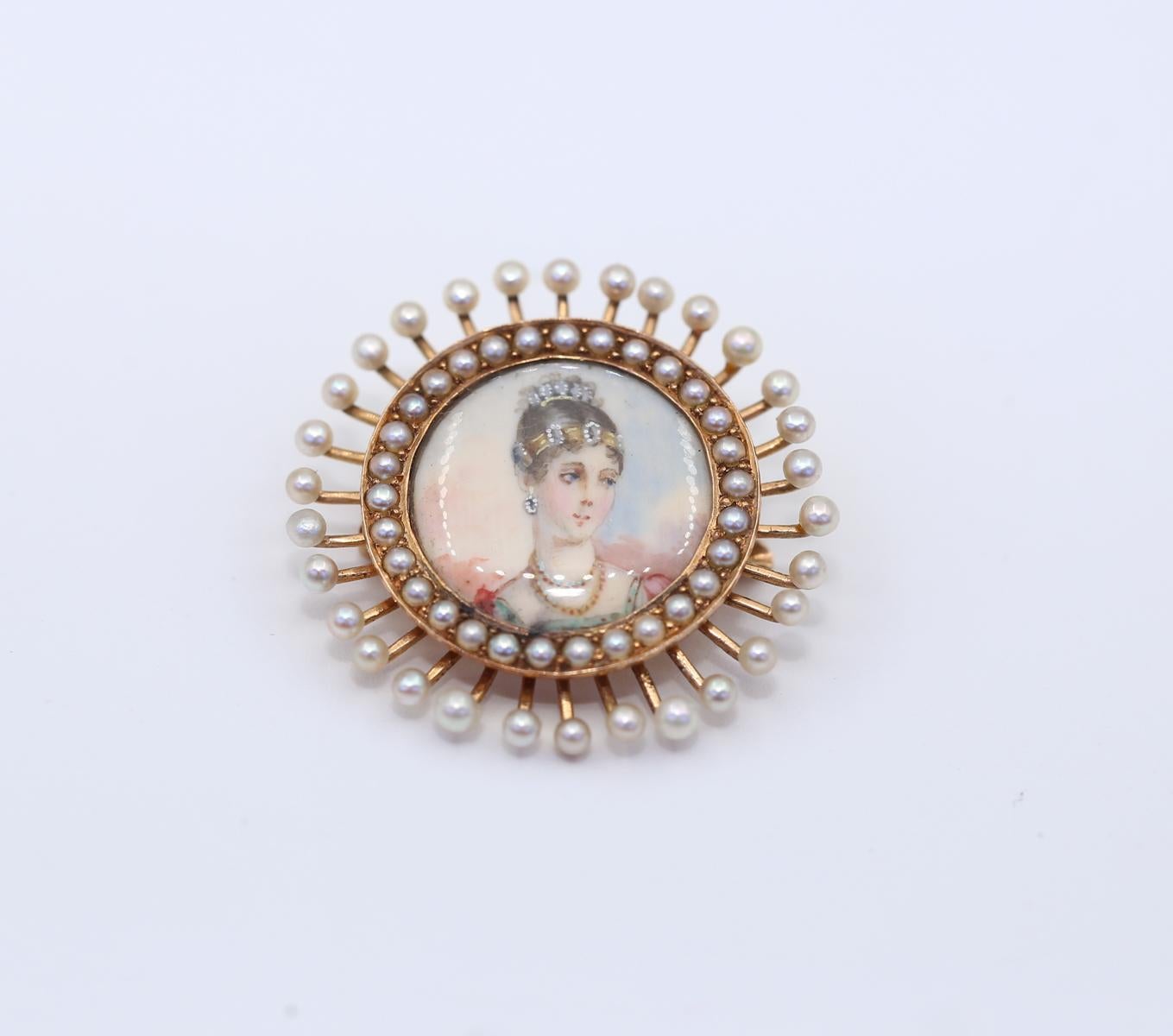 Pendant Brooch Portrait Lady Pearls 14K Gold 27 March, 1890.
Amazingly delicate and marvelous painted ladies' portrait surrounded by fragile Pearl beads on tiny legs and another line of Pearls on the inner circle. An item to have in any jewelry
