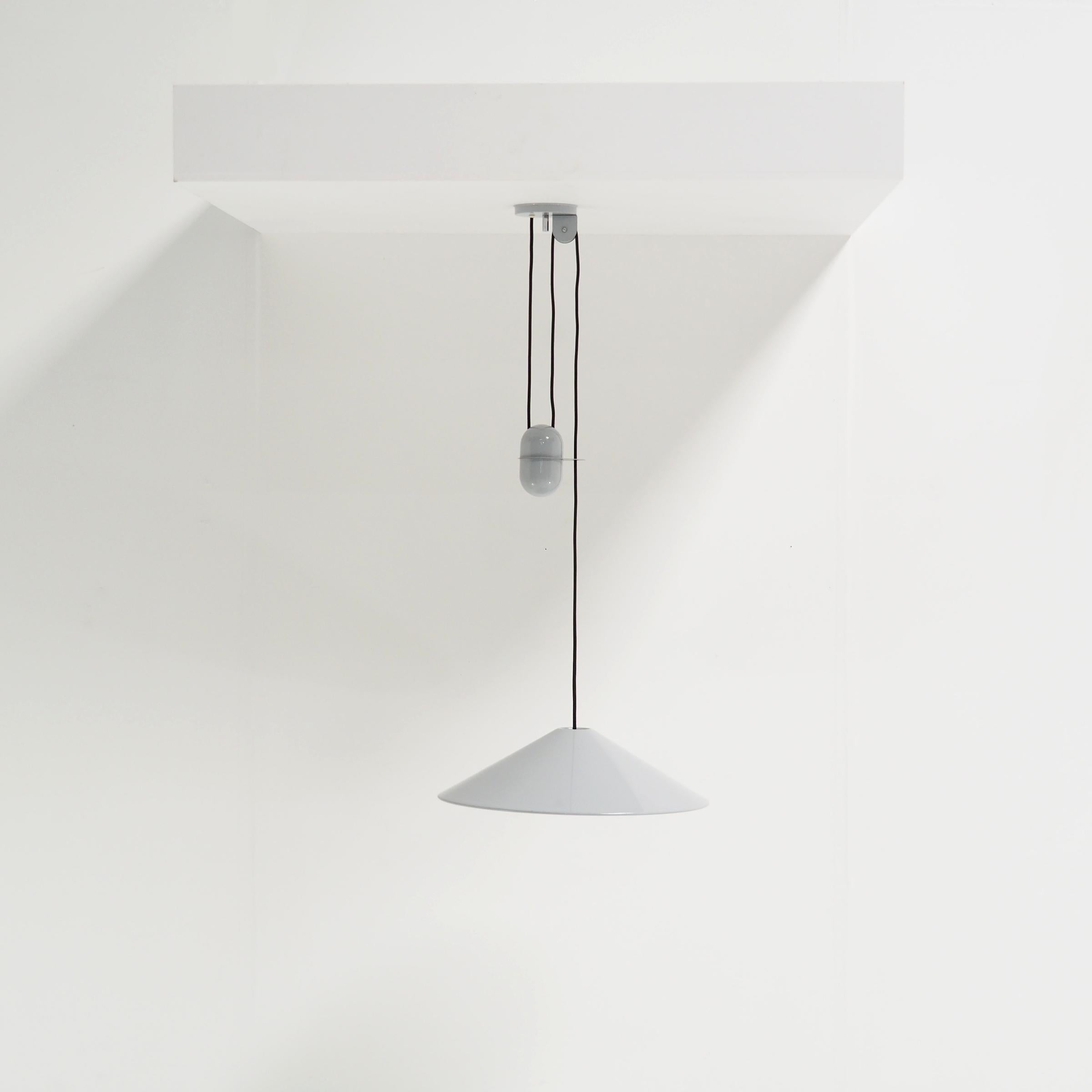Counterweight pendant designed by Italian designer Goffredo Reggiani. Reggiani was the founder of Reggiani Spa Illuminazione, founded in 1957.

The lamp has been professionally rewired by my restorer and restored where necessary. Therefore it’s in