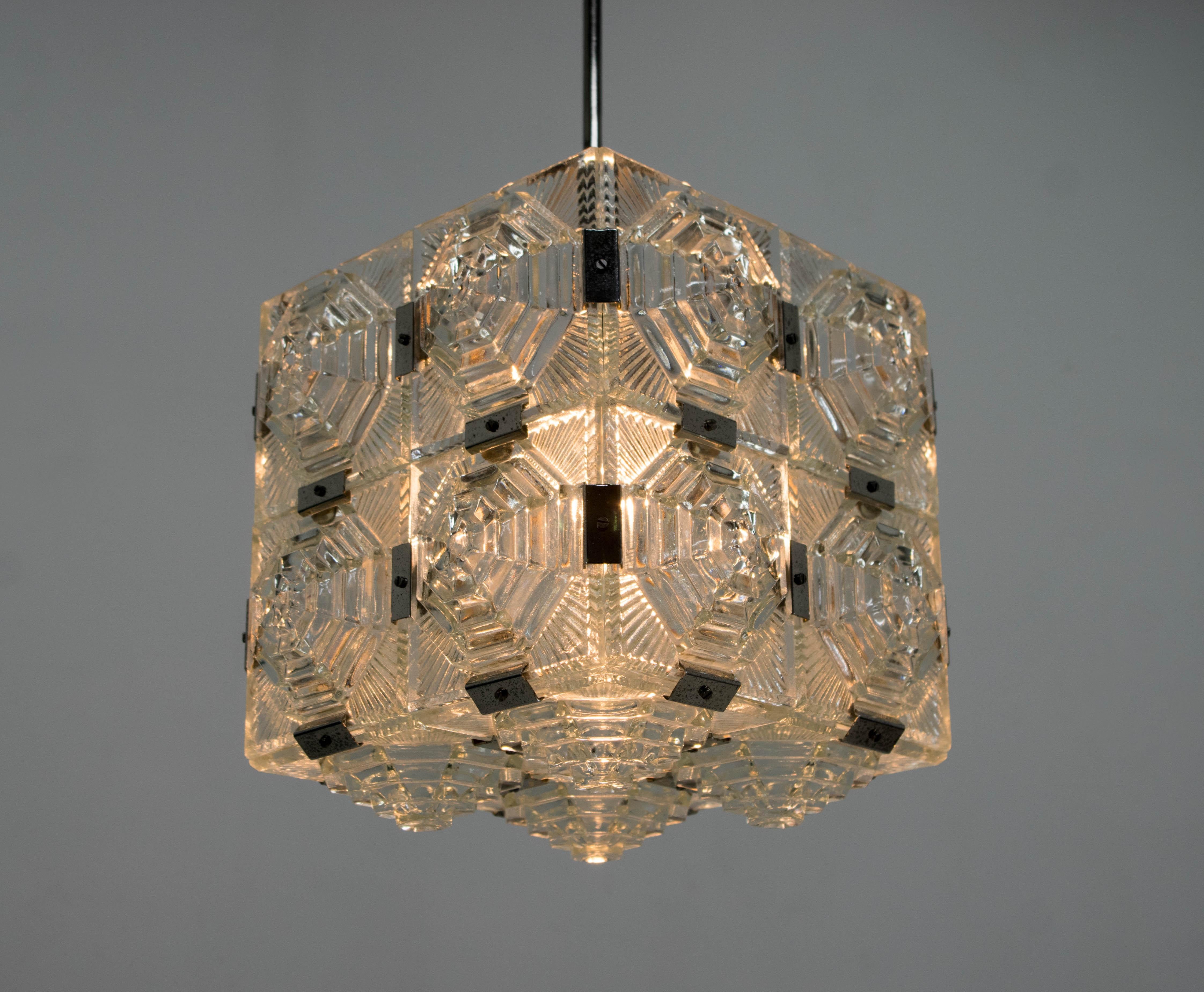 Beautiful glass pendant with Aztec pattern.
Designed by Jaroslav Bejvl and executed by Kamenicky Senov
Cleaned, rewired
Rod can be shortened on request
1x100W, E25-E27 bulb
US wiring compatible.