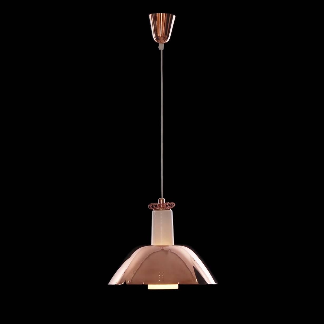 Polished coper pendant designed by Paavo Tynell for Idman, Finland, circa 1950s. Marked Idman. Newly European wiring, rewiring available upon request.