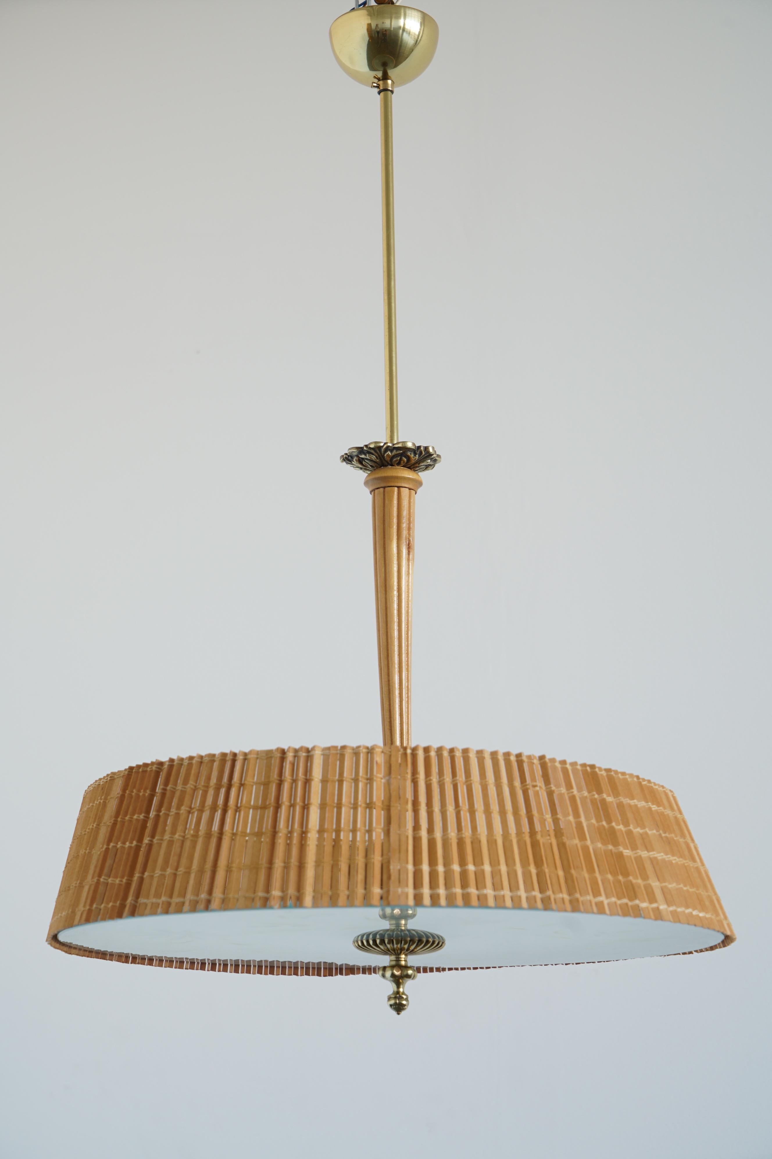 Paavo Tynell's ceiling light with hand painted glass diffuser by Kyllikki Salmenhaara, manufactured by Taito Oy,Finland. Circa 1940-50´s.
 2 Edison sockets. Two fixtures available with different paint pattern. Rewiring available upon request.
