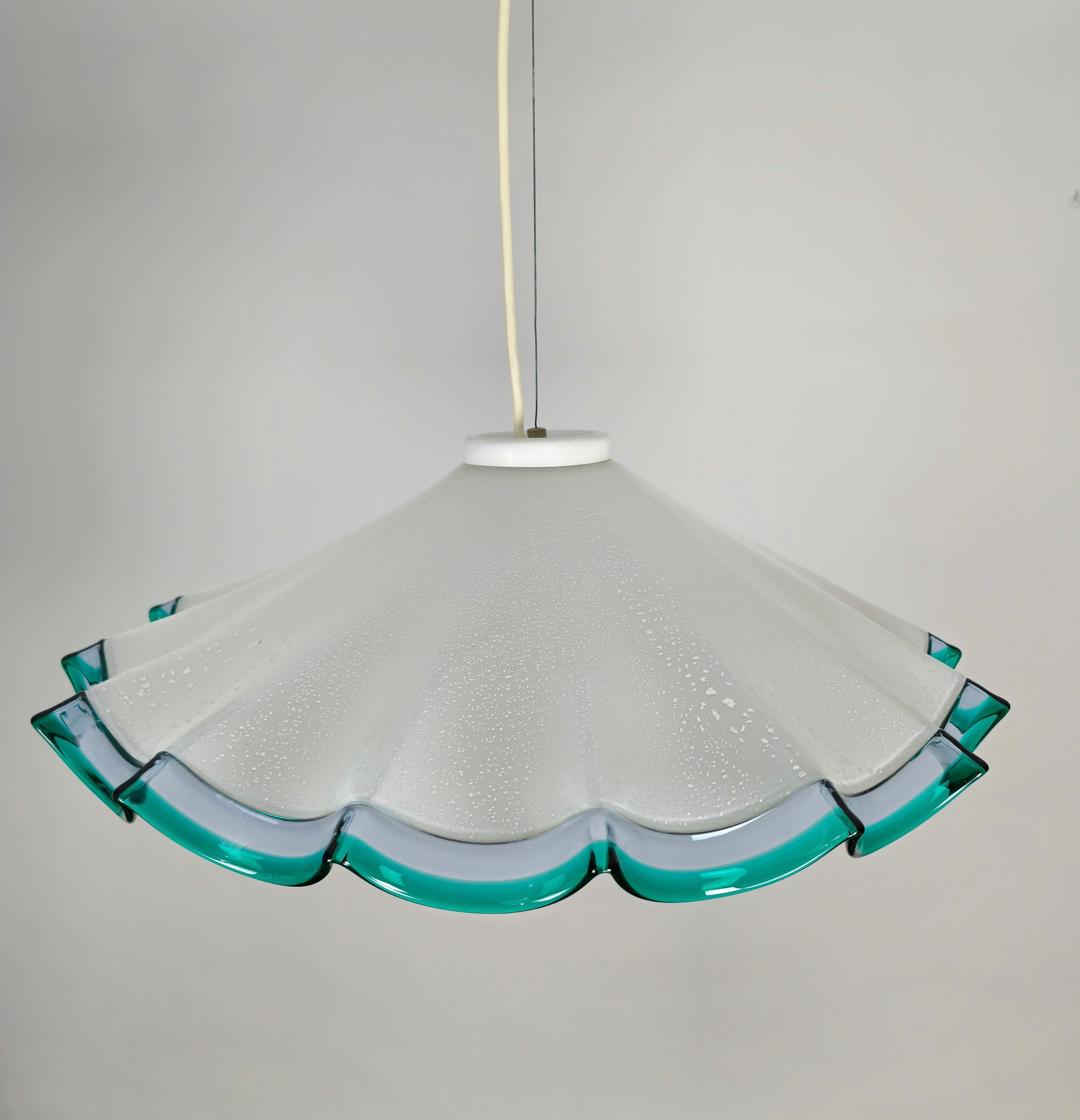 Suspension lamp produced in Italy in the 1980s.
The suspension lamp was made of multicolored and wavy hand-blown Murano glass with traditional Venetian techniques.



Note: We try to offer our customers an excellent service even in shipments all