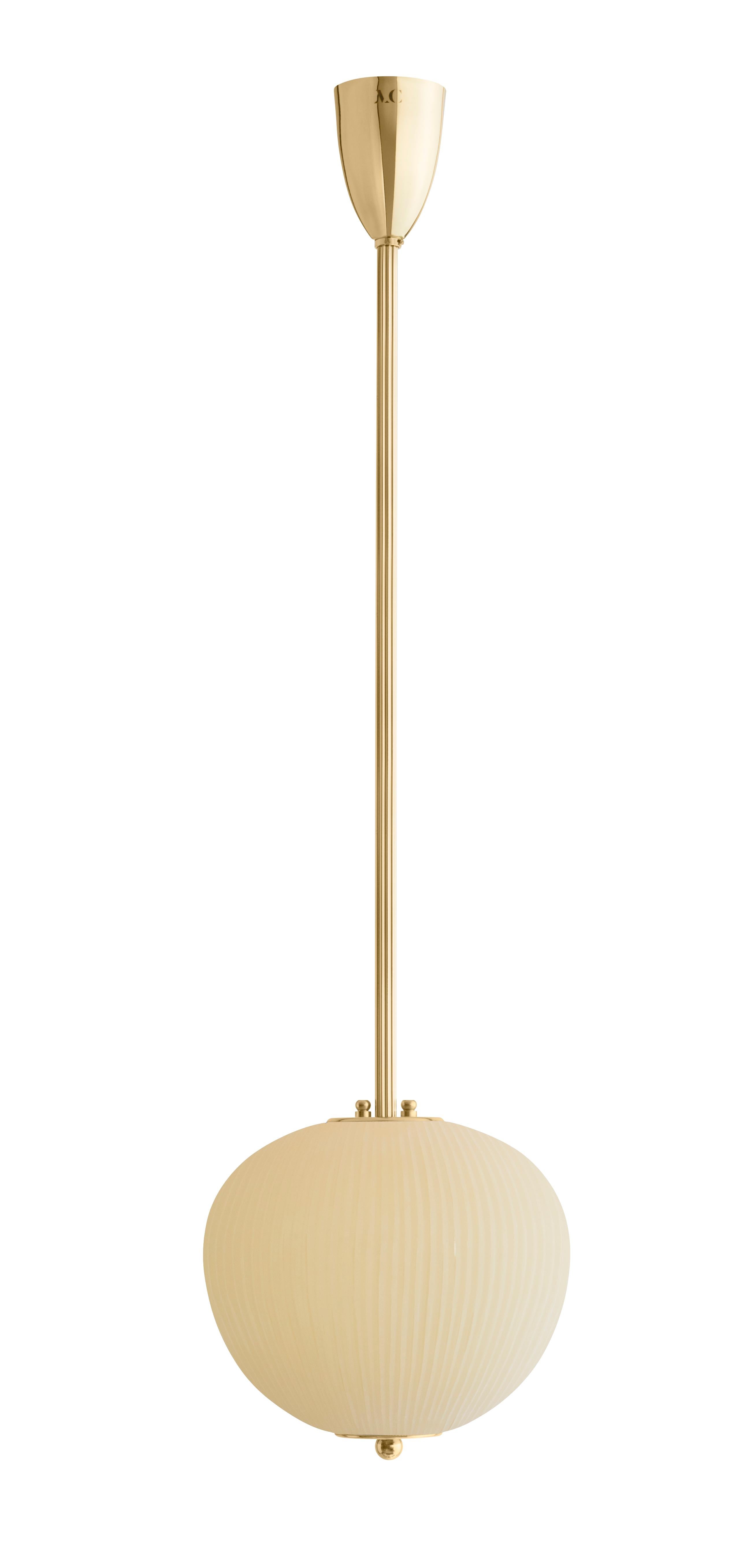 Pendant China 03 by Magic Circus Editions
Dimensions: H 90 x W 26.2 x D 26.2 cm, also available in H 110, 130, 150, 175, 190
Materials: Brass, mouth blown glass sculpted with a diamond saw
Colour: Mustard yellow

Available finishes: Brass,