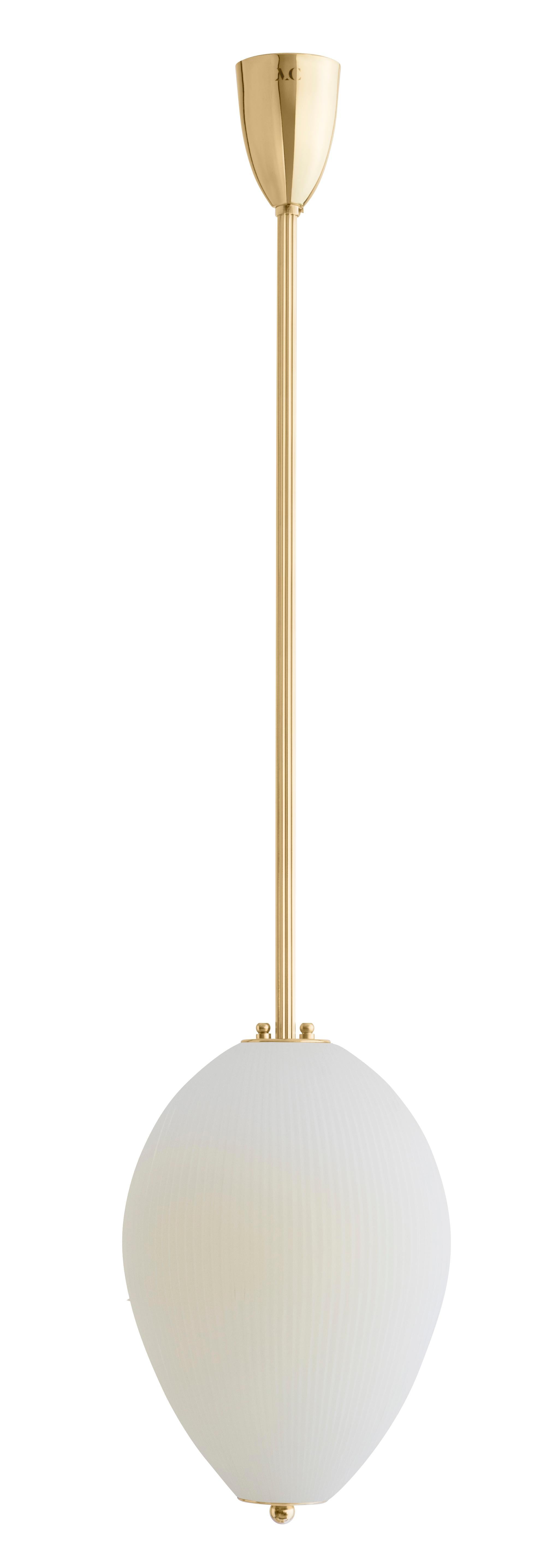 Pendant China 10 by Magic Circus Editions
Dimensions: H 90 x W 32 x D 32 cm, also available in H 110, 130, 150, 175, 190 cm
Materials: Brass, mouth blown glass sculpted with a diamond saw
Colour: ivory

Available finishes: Brass,