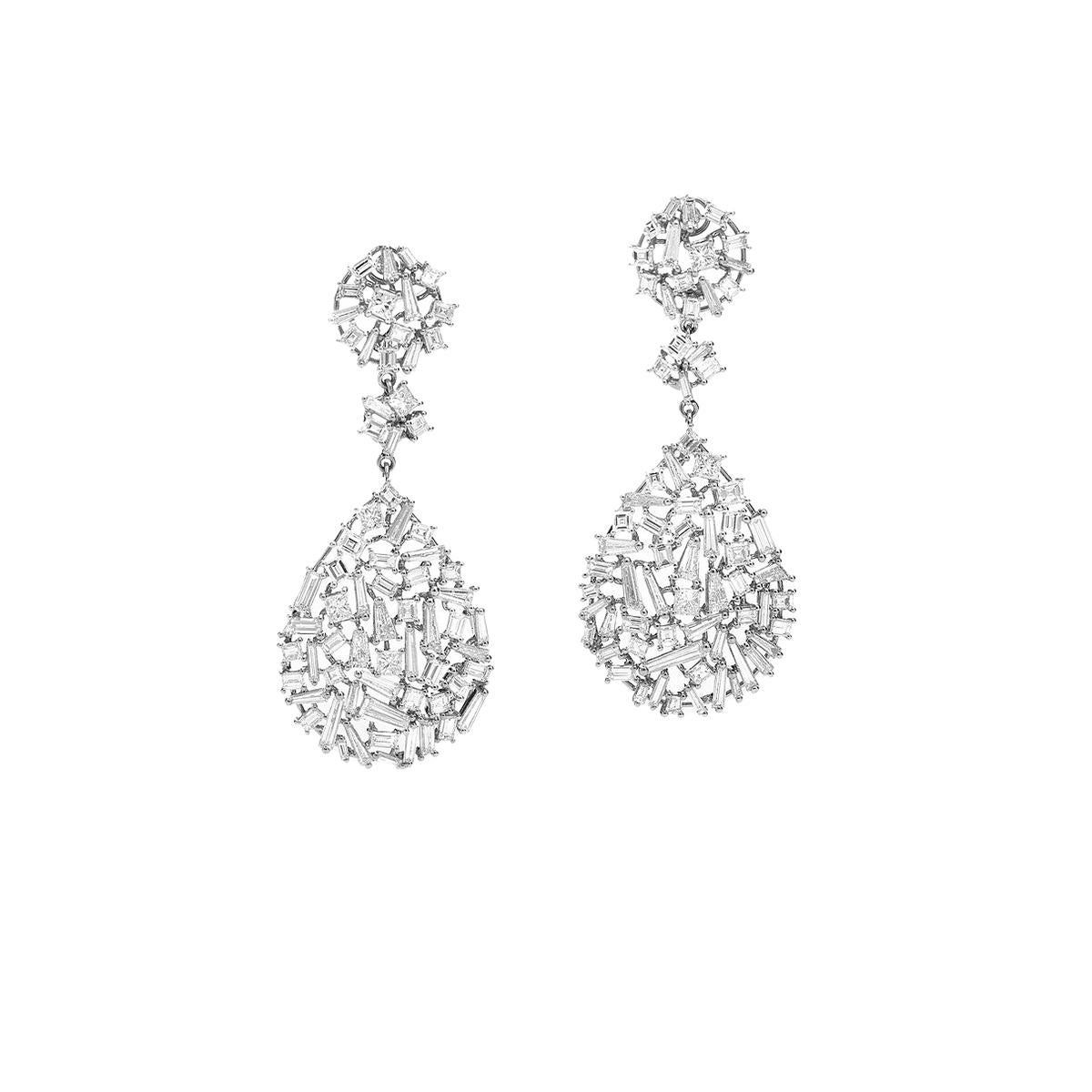 Earrings in 18kt white gold set with 144 baguette, princess, tapers cut diamonds 8.02 cts       