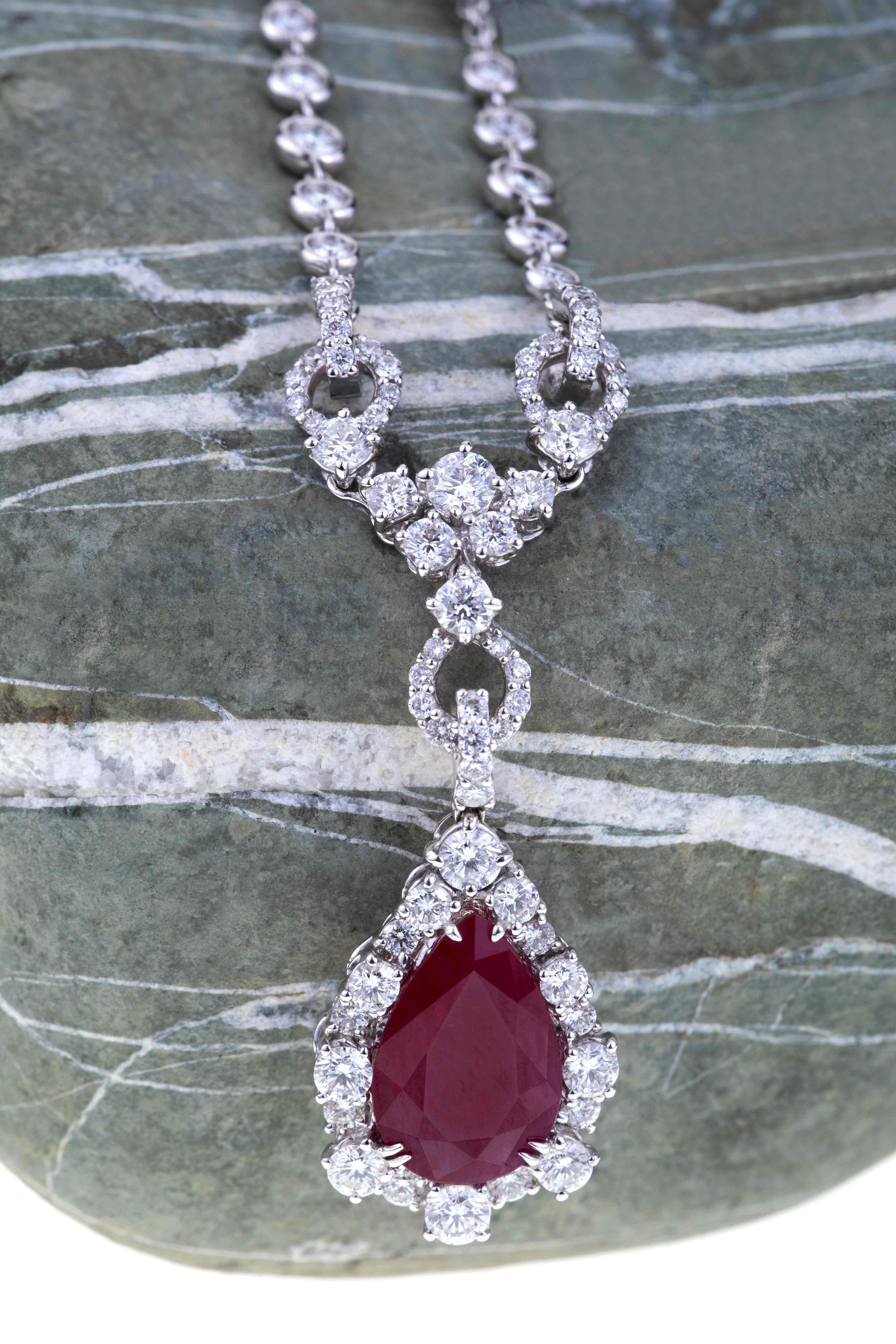 Contemporary Pendant Drop Cut Ruby ct. 3.57, Diamonds Setting like a Royal Blood For Sale