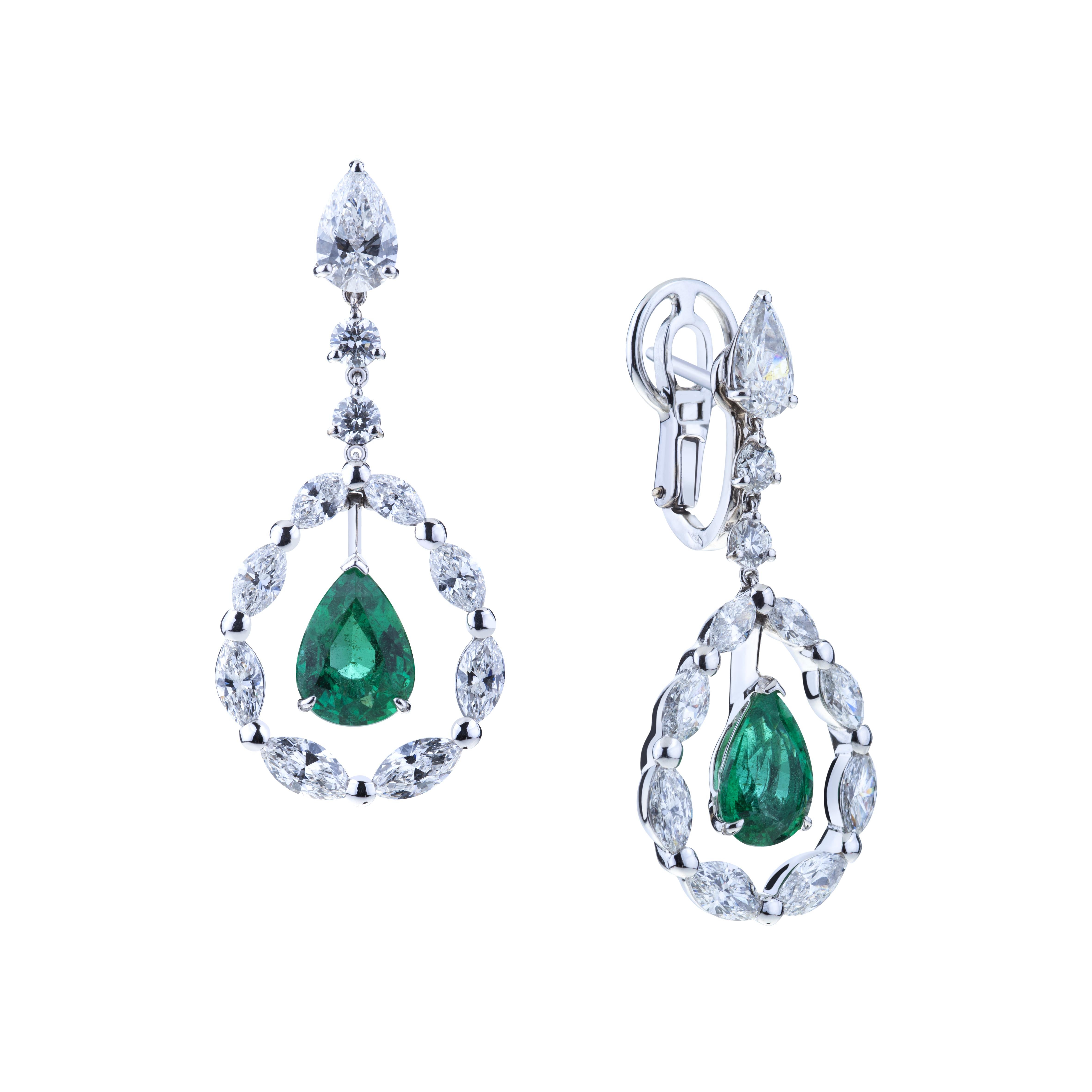 Pendant Drop Emerald Earrings in a Circle of  Navette Diamonds and Solitaire.
Delicious Proportion for a Couple of Drop Emerald ct. 2.65 (NH) in a circle of Light given by 8 Diamonds and Solitaire on top, total ct. 3.58. 18kt Gold wheight is 7.4