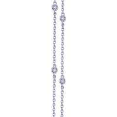 Pendant Drop Emerald Necklace in a Circle of Diamonds and Blue Sapphire Drop