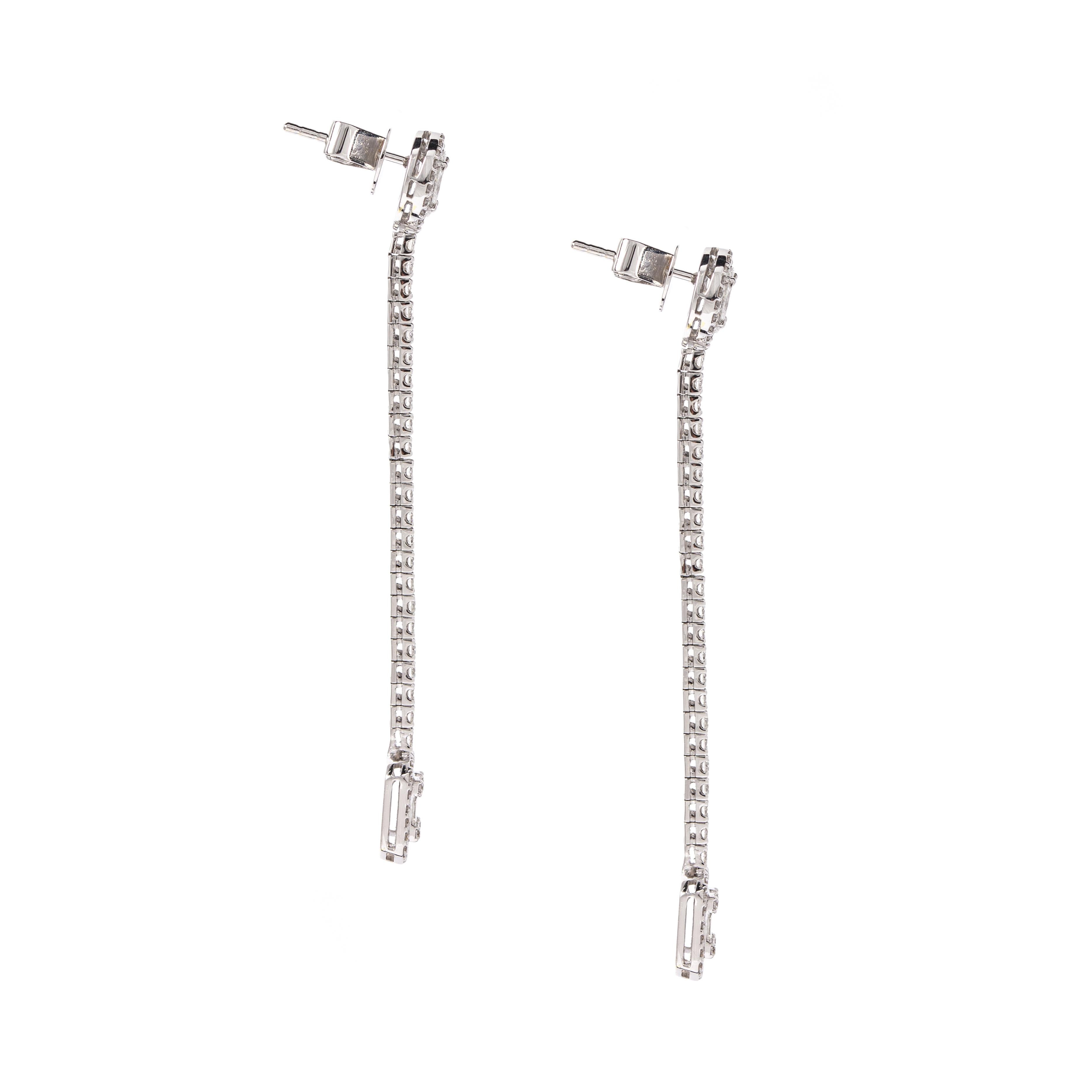 diamond pendant and earrings