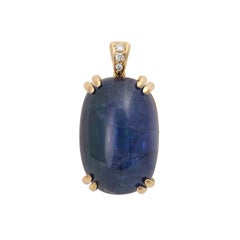 Pendant, Especially with 1 Tanzanite Cabochón 54 Cts. with a Natural Inclusion P