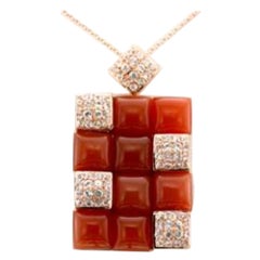Pendant featuring Moonstone, White Sapphire set in 14K Strawberry Gold