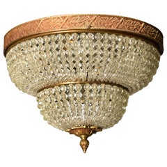 A fine bronze pendant with beaded dome. 